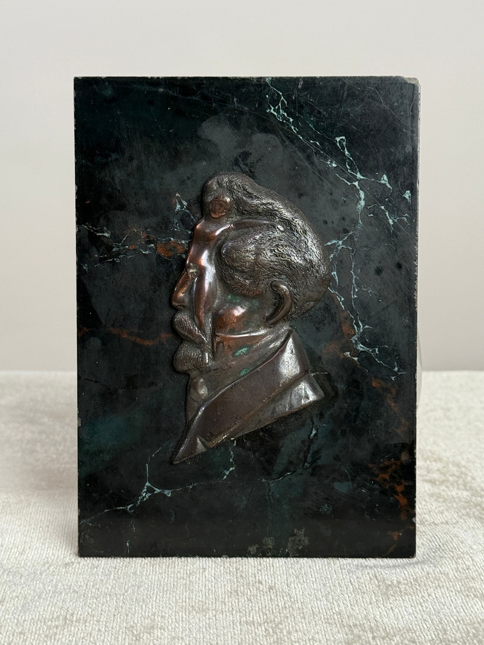 Antique 1920s Bronze Marble Erotica Portrait Plaque Freud ‘what’s on man’s mind’: A whimsical interpretation of Sigmund Freud's 'Whats on a Mans Mind'. A bronze and marble wall plaque with optical illusion face of a man in which a naked woman is hidden. Anonymous Scandinavian maker