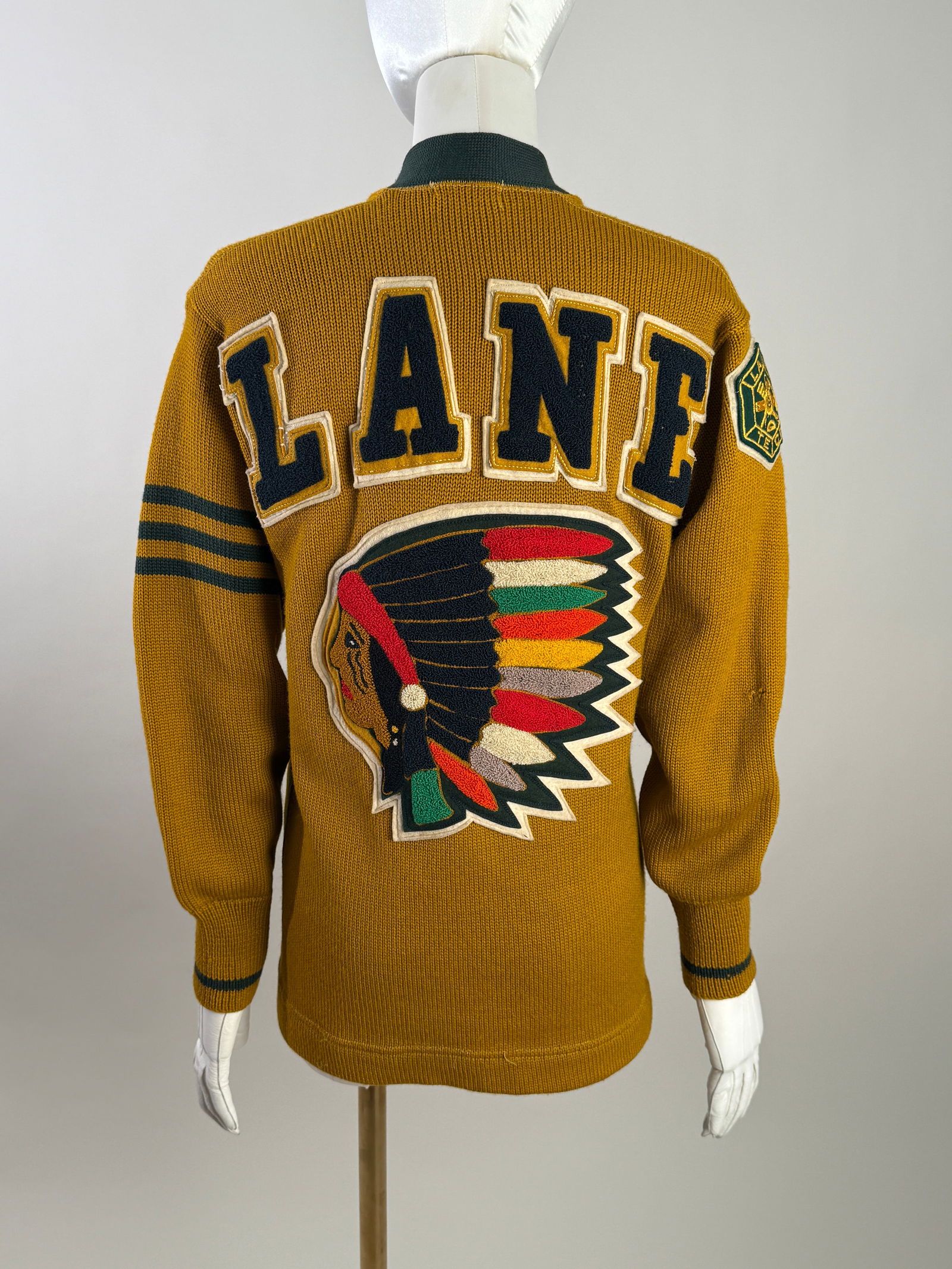 Vintage 1940s 50s Lane Tech Chicago Wool Letterman Sweater Cardigan Chenille Patch: Vintage Lane Technical High School letterman sweater in rich mustard gold with forest green trim. 100% wool athletic knitwear cardigan features bold “LANE” chenille lettering across the back w