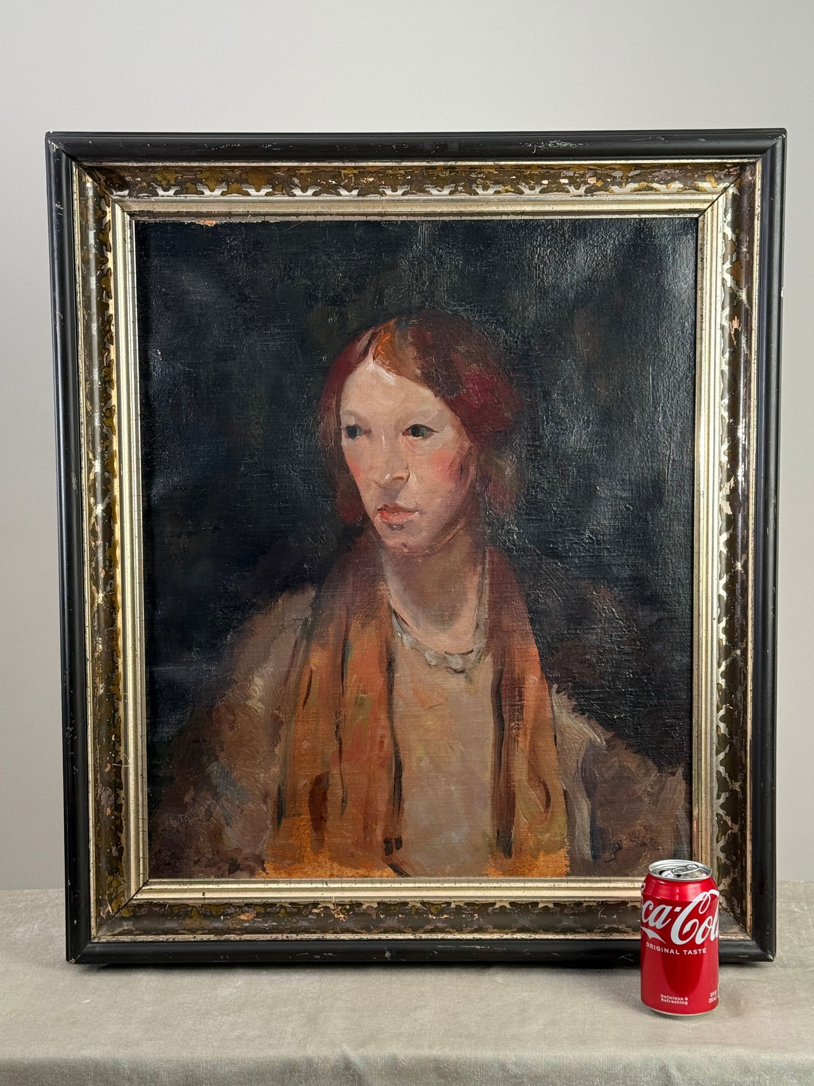 Antique 1920s Portrait of a Lady Oil Painting on Canvas, Signed: Original circa 1920s 30s oil on canvas portrait painting depicting a young woman in three quarter view with draped garment and necklace, rendered in a soft interwar style. The painting is signed on th