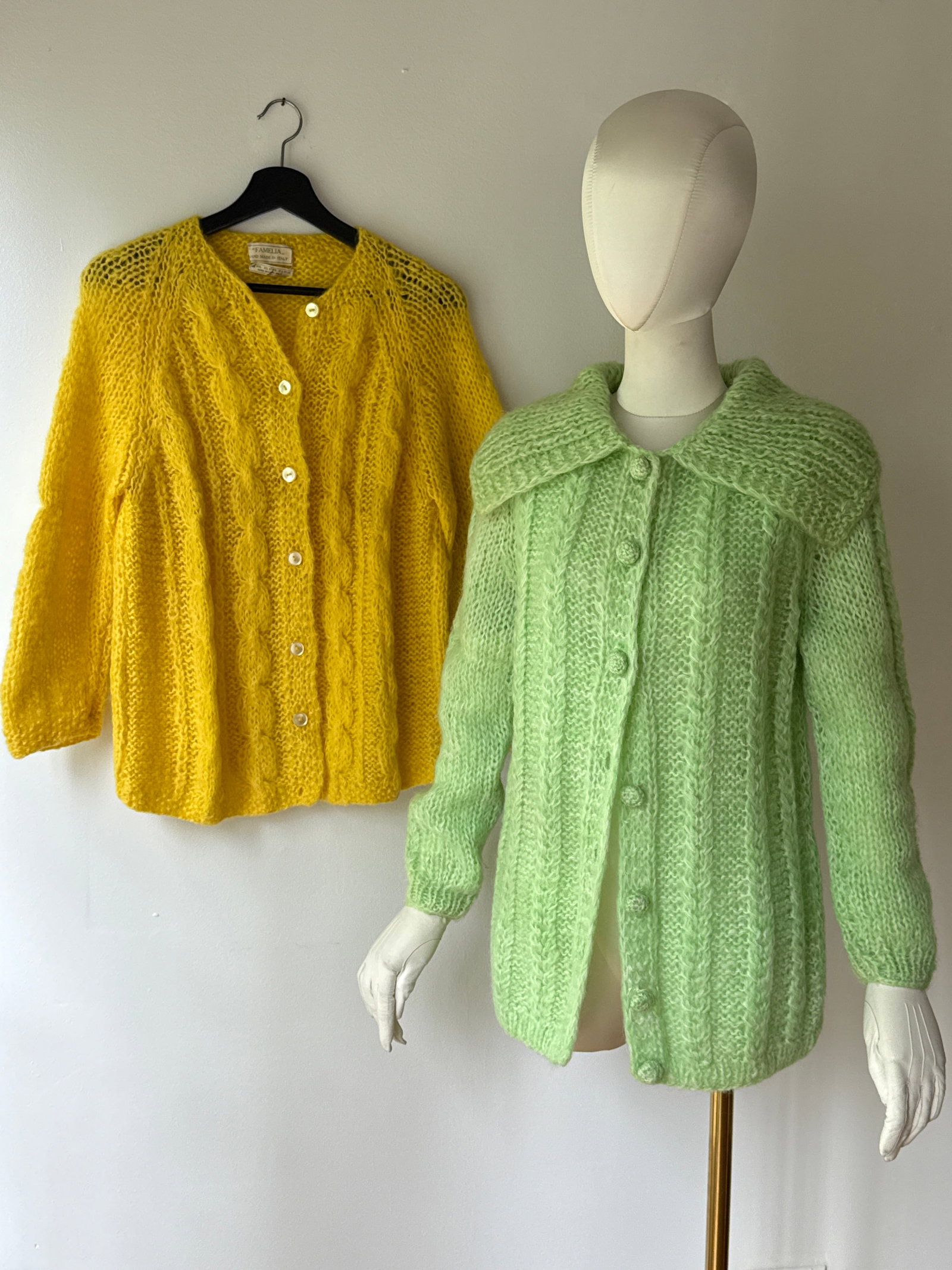 Two Vintage Italian Mohair Wool Cardigan Sweaters, Yellow & Mint Green: Two vintage mid century hand knit sweaters imported from Italy. The first is a vibrant yellow Famelia brand cardigan featuring a heavy puffy stitch and cable texture, made from an 80% wool, 10% mohair