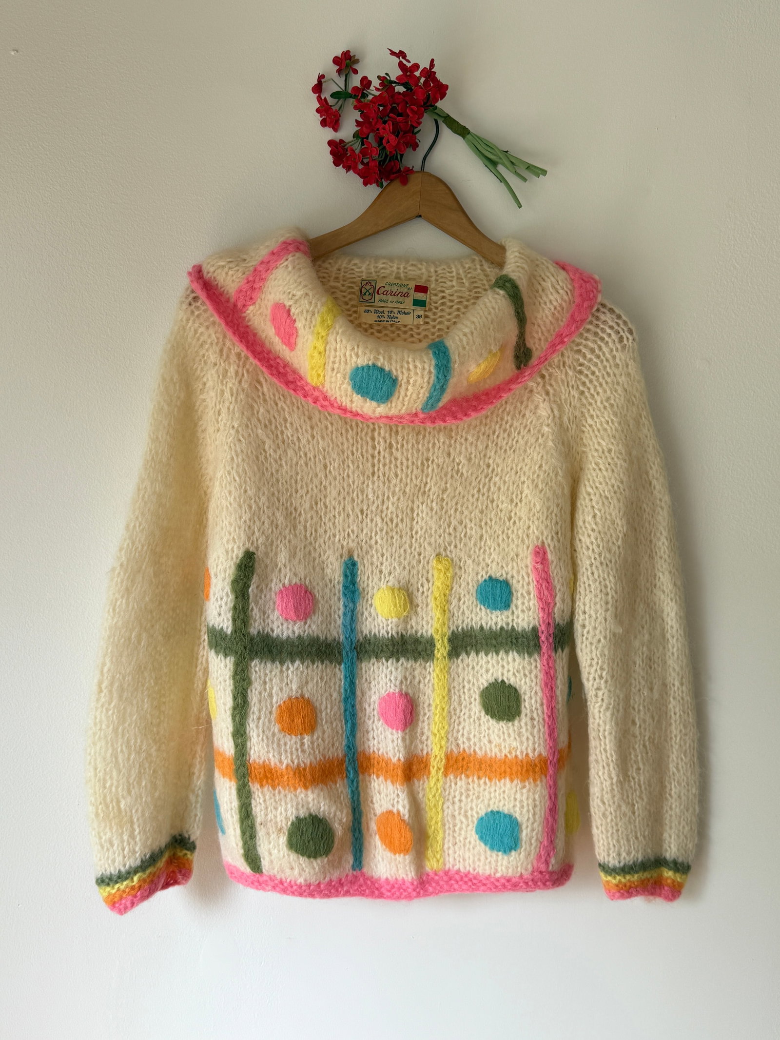 Vintage Creazione of Carina Made in Italy Wool Mohair Knit Cardigan Sweater: Vintage Italian cardigan from Creazione of Carina. A blend of 80% wool and 10% mohair for a soft, fuzzy texture. The sweater is made in Italy and features a cream colored chunky knit with colorful pop