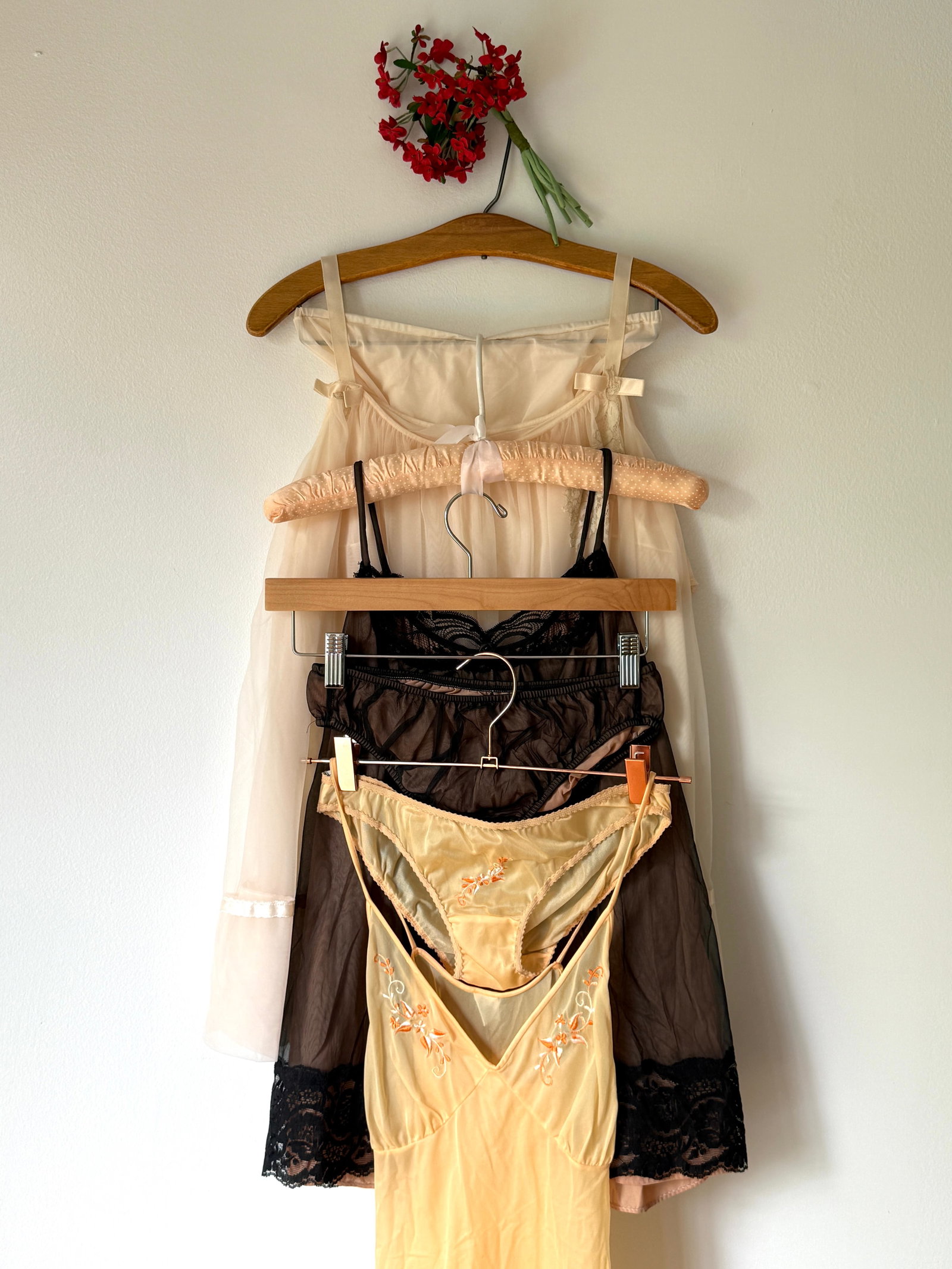 Group (3) Vintage Nylon Babydoll Lingerie Sets, Lace & Embroidered Details: This lot features three sets of vintage nylon babydoll lingerie including a black sheer top with lace trim and matching panties, a cream colored babydoll with lace accents and matching high waisted un