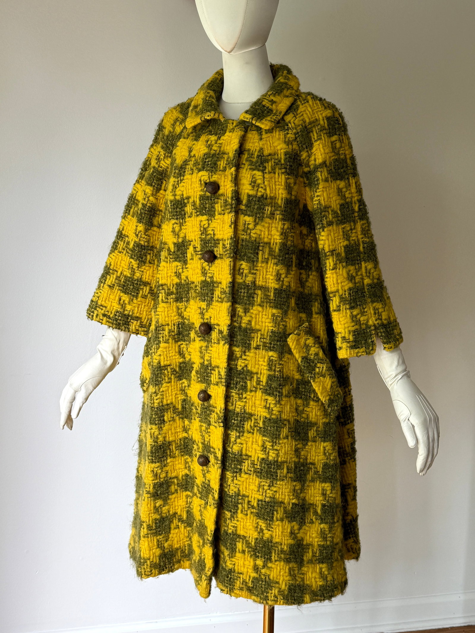 Vintage 1960s 70s Yellow Olive Houndstooth Wool Tweed Coat: Vintage 60s 70s wool coat with houndstooth pattern in yellow and olive green by Wm. a. Lewis crafted from a thick, textured wool tweed with a visible chunky weave, the garment includes a classic