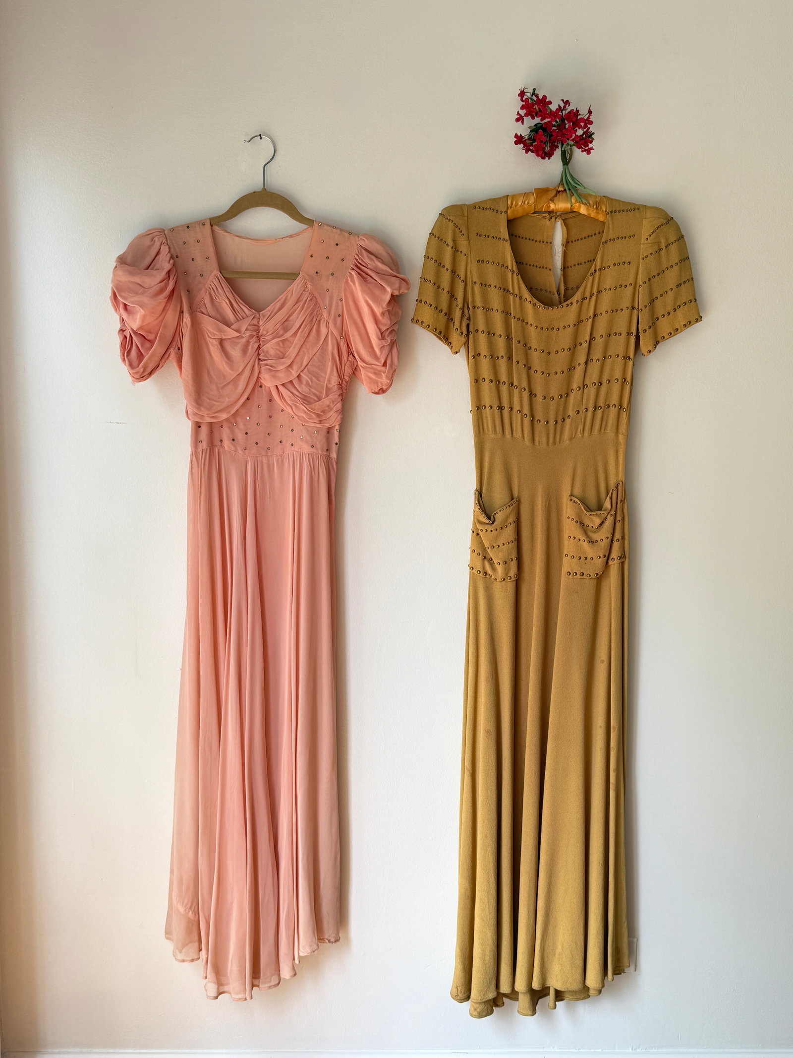 Two Vintage 1930s Old Hollywood Dresses, Studded Crepe & Rhinestone Chiffon: Two 1930s era dresses, the first is a yellow crepe gown featuring horizontal rows of metal studs across the bodice and pockets, and structured padded shoulders. Measurements: 32” bust, 25”
