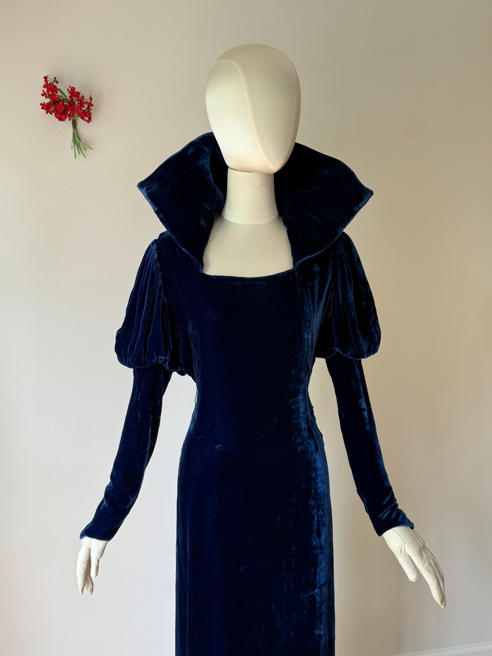 Vintage 1930s Royal Blue Silk Velvet Gown: Vintage 1930s Old Hollywood deep royal blue velvet gown. The garment features long puff sleeves, structured pop up collar with piping on reverse, and bias cut with long flowy skirt. Metal side snap cl