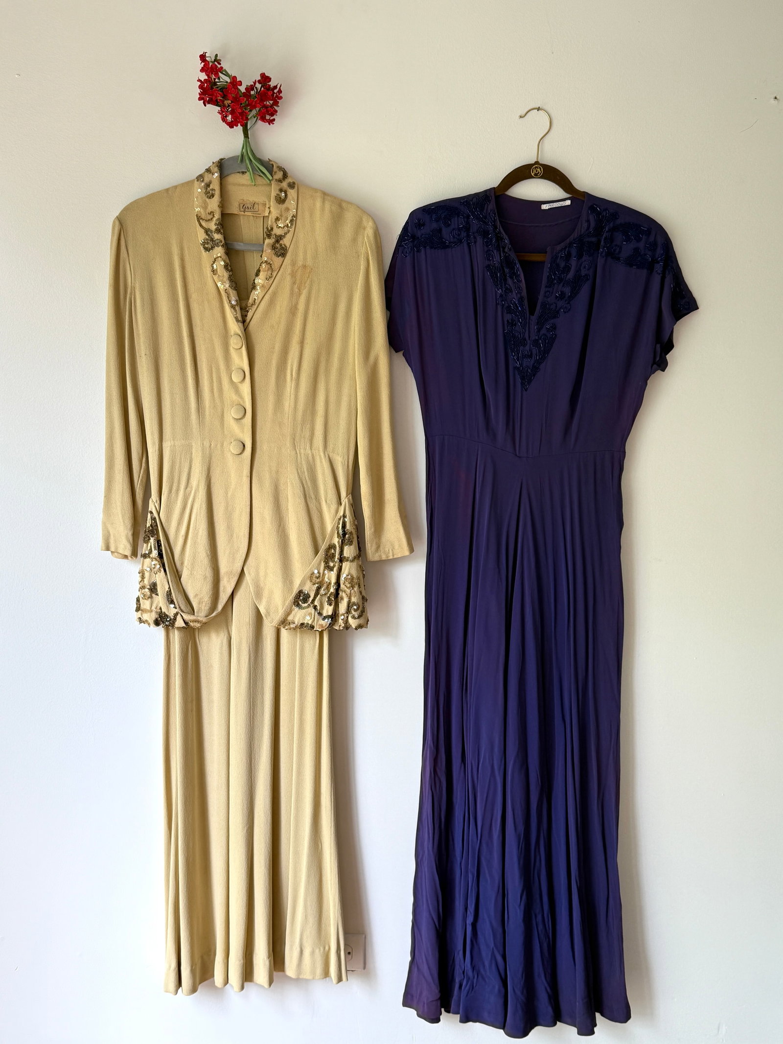 Two Vintage 1940s Crepe Evening Dresses with Encrusted Sequins: Vintage 1940s dress ensemble lot of two. The first is a two piece champagne crepe ensemble by the Chicago label Gail, comprising a floor length dress and a coordinating tailored jacket with heavily en