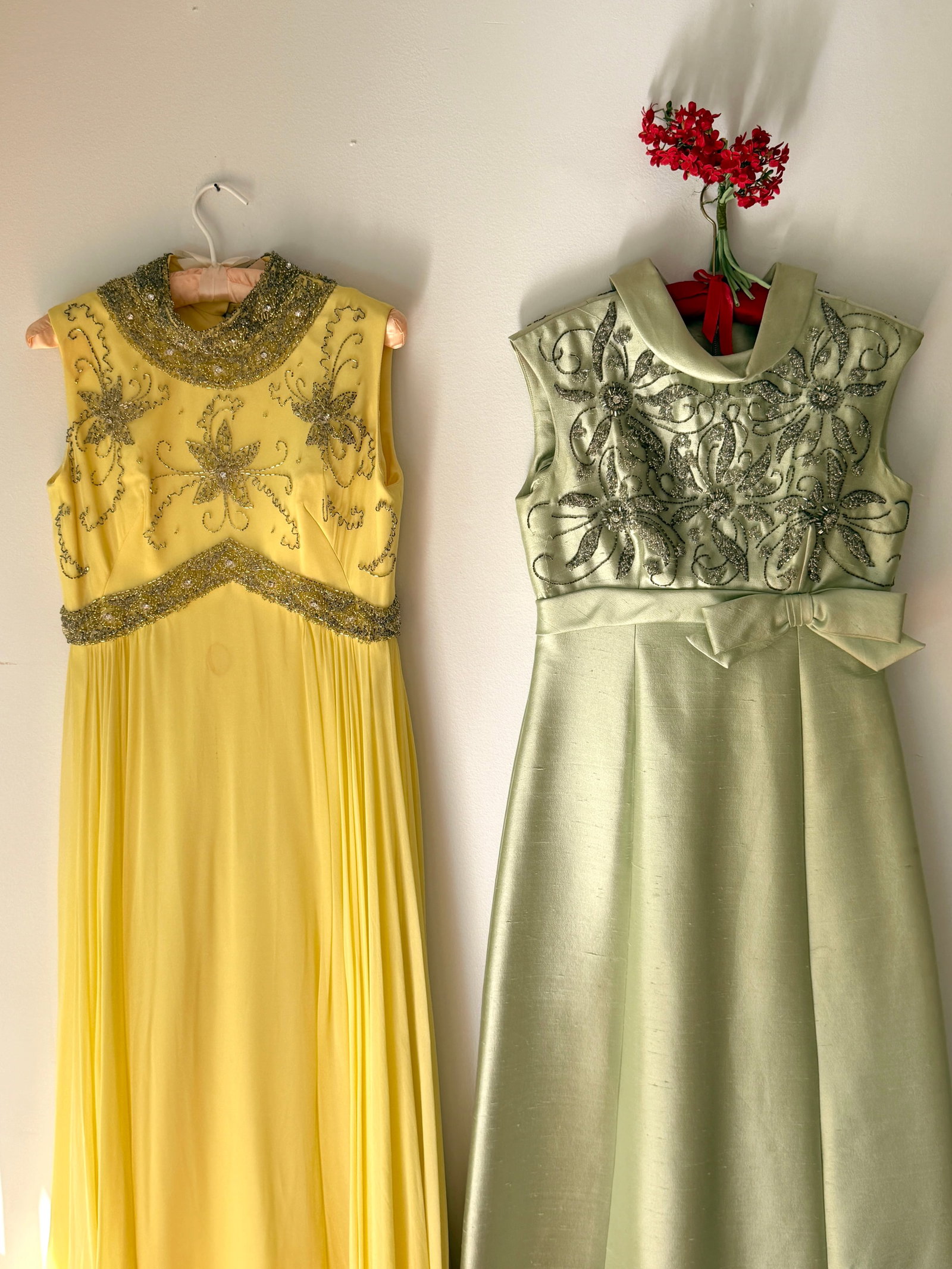 Two Vintage 1960s Beaded Evening Gowns, Yellow and Mint: Two mid century c1960s fancy dresses, a lemon yellow chiffon dress with an empire waist and bodice heavily embellished with shimmering silver glass beads and sequins in a starburst pattern. The second
