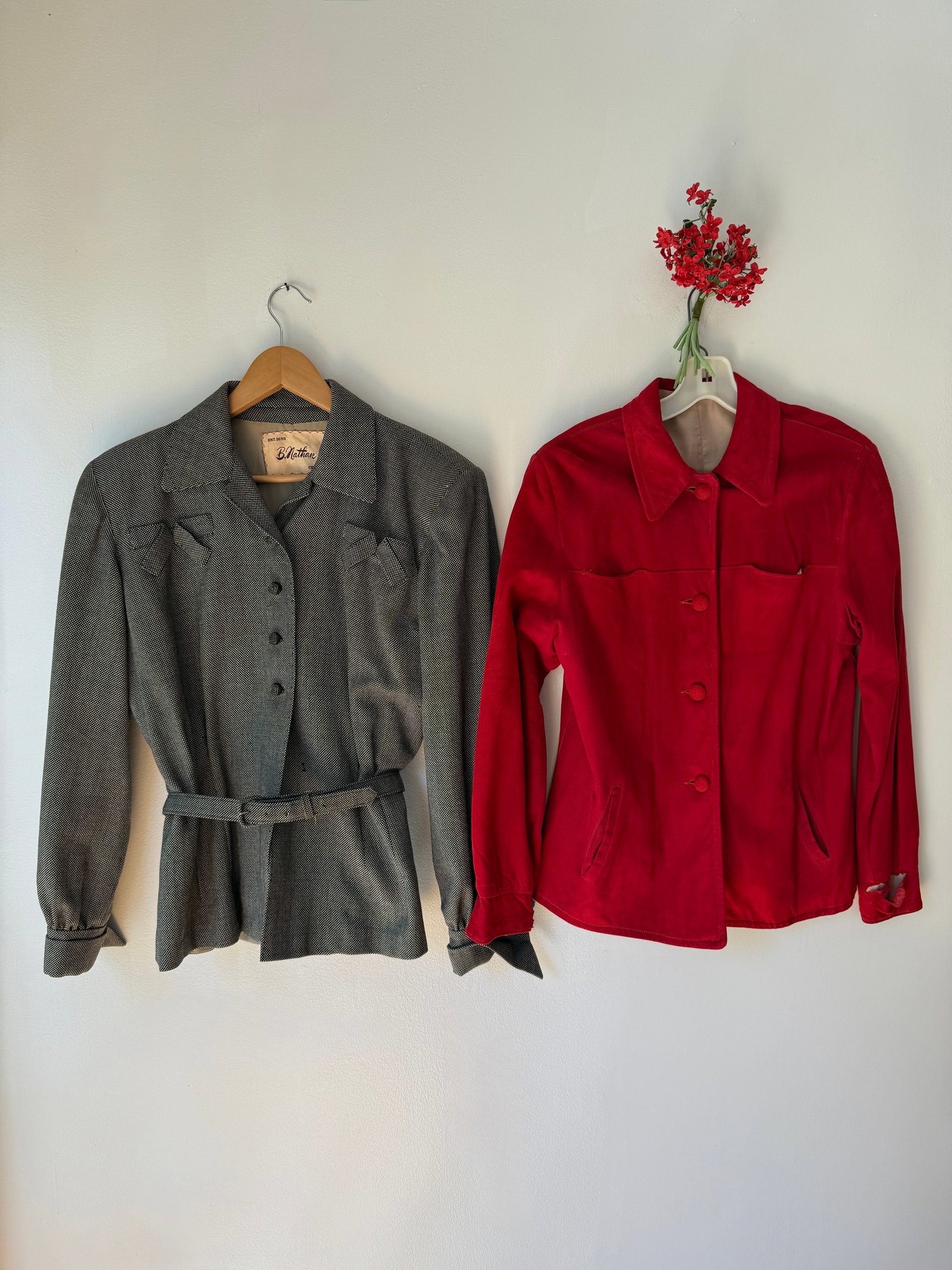 Two Vintage 1940s Tailored Jackets by Leathermode and B. Nathan Chicago: Two 1940s jackets- first is a vibrant red suede jacket by Leathermode, featuring a pointed collar and top stitched pocket details. The second is a structured grey birdseye wool jacket by Chicago cloth