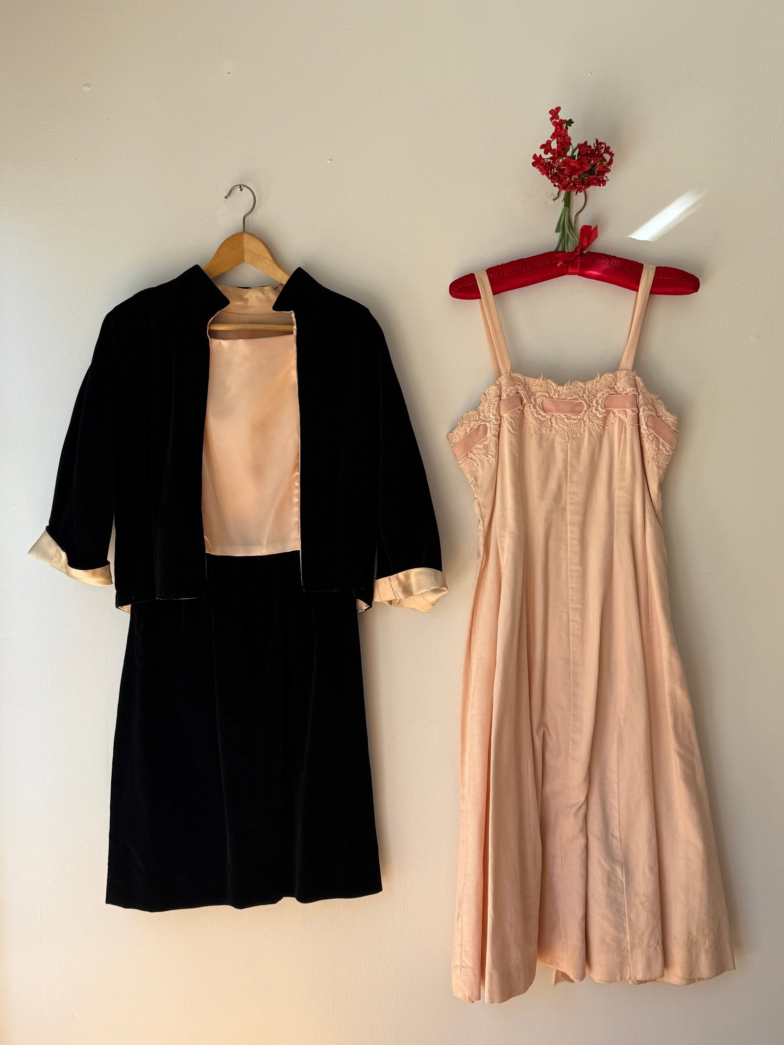 Lot of Two Vintage Mid Century Dresses Velvet Satin Evening Set & Pink Cotton Day Dress: This lot features two mid century womenswear pieces- The first is a 1950s black velvet and pale pink satin evening ensemble, consisting of a dress with a fitted satin bodice and a matching cropped vel
