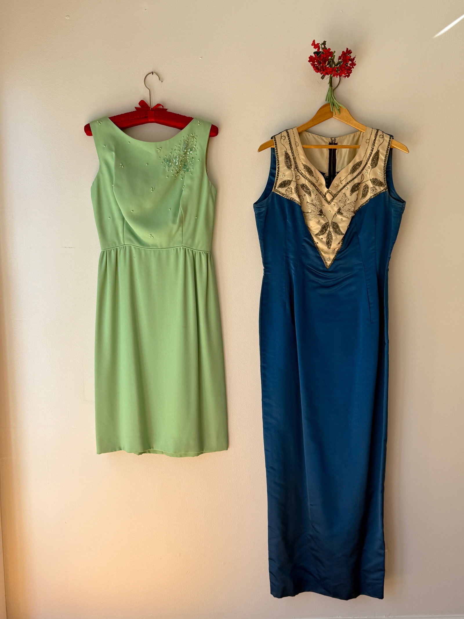 Lot of Two Vintage MCM Dresses, Blue Beaded Gown & 1960s Mint Green Butterfly: This lot features two mid century evening and cocktail wear. The first is a 1950s floor length royal blue satin gown with cream colored V neck bodice insert intricately embellished with metallic silve