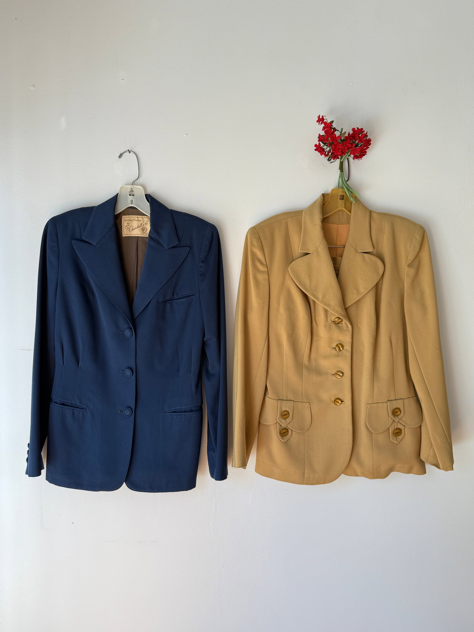Lot of Two Vintage 1940s Women’s Suits, Navy Wool Jacket and Tan Two Piece Skirt: Two well tailored pieces from the 1940s- the first is a navy blue jacket with a classic three button front, notched lapels, and structured shoulder pads by Churchill & Co. Chicago. (does not include a