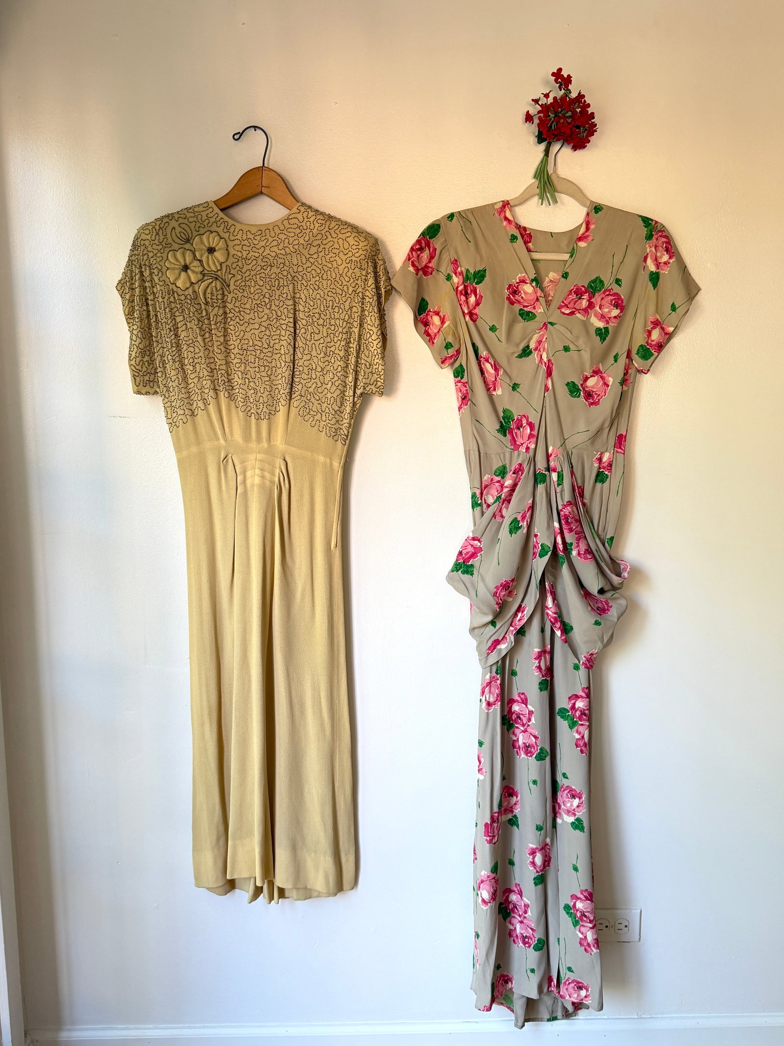 Two Vintage 1940s Summer Dresses, Glass Embroidery & Floral: Lot of two vintage dresses from the 1940s. First is a yellow crepe day dress covered in glass beadwork and flower on the bodice m: 34" bust, 26" waist, 48" length. The second is an ivory and pink flor
