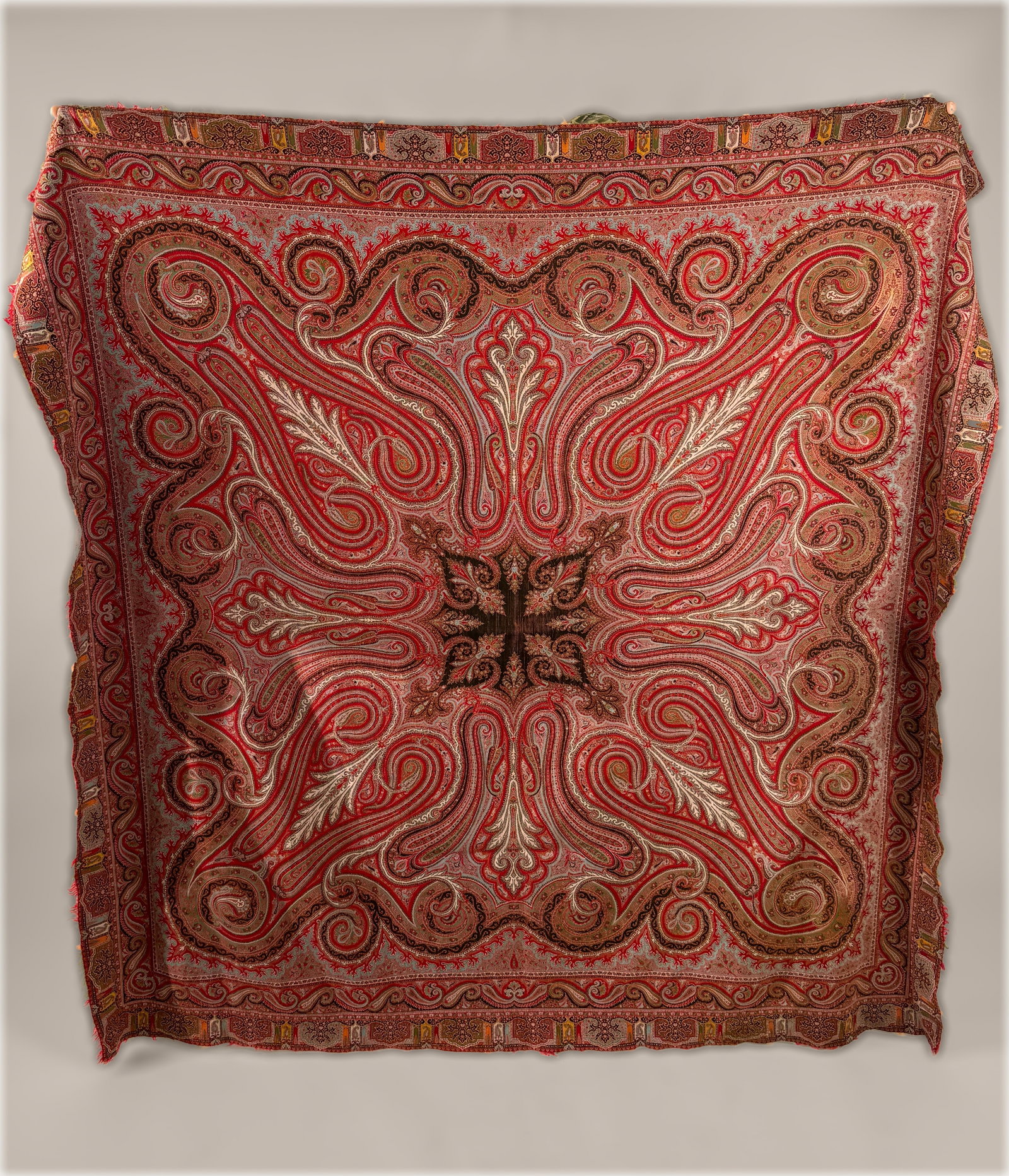 Antique 19th Victorian Kashmir Woven Wool Paisley Shawl Blanket Throw (#1): 19th century Victorian Kashmir style woven wool shawl featuring a complex, dense all over botanical design with large swirling paisley motifs. The textile is composed of a stylized, four pointed black