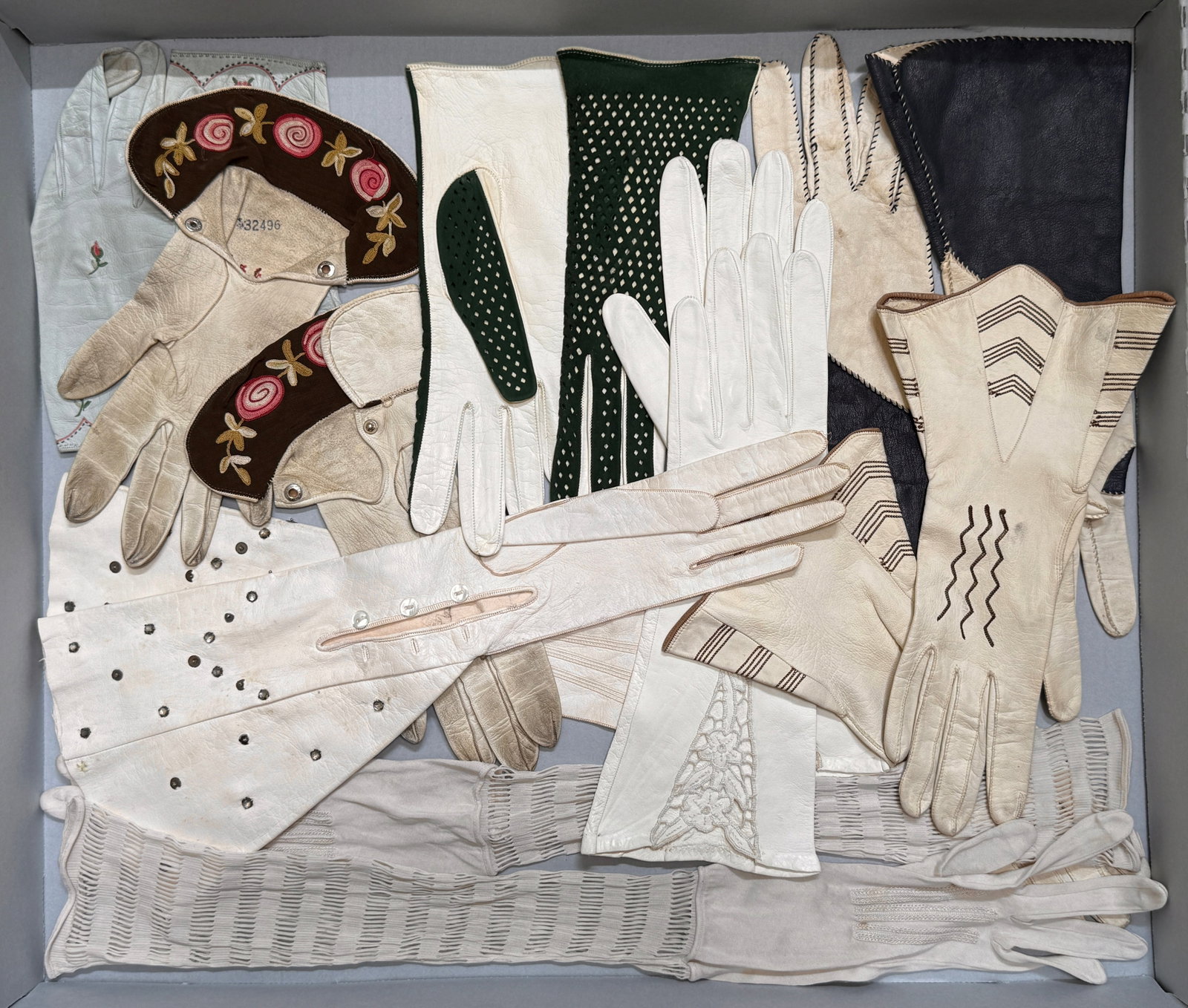 Vintage & Antique Women's Gloves Group: Leather, Velvet, Lace, Gauntlet: Collection of vintage and antique women's dressy gloves: pink velvet, opera length, rhinestone, embroidered and various leather gauntlets. Mostly 1900s to 1940s. Small sizes, 6 & 6.5, some smaller.