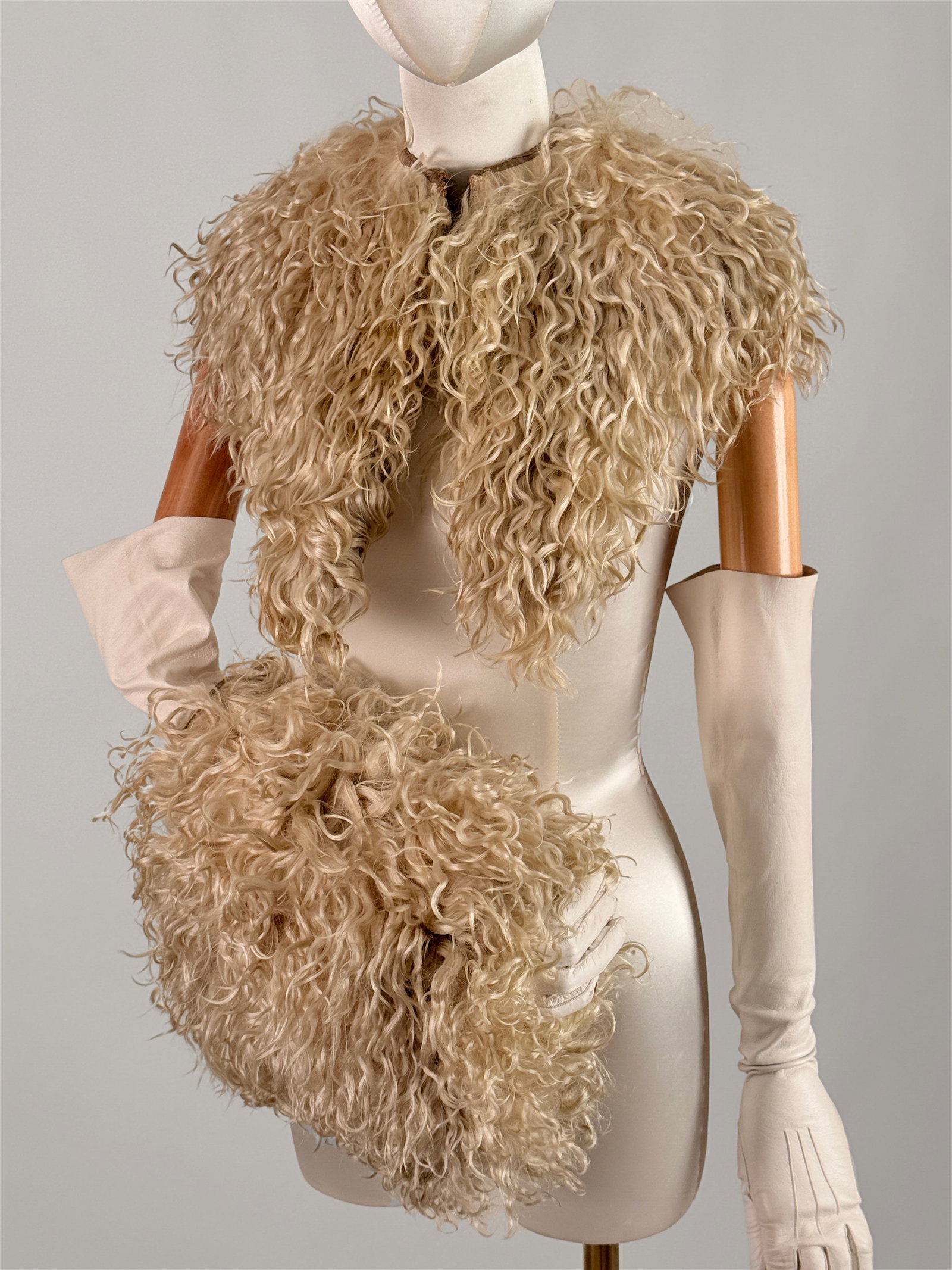 Antique 1900s Curly Lamb Fur Capelet/ Stole and Muff Set: Antique two piece winter accessories matching set from circa 1900 featuring a small capelet and matching hand muff. Long pile cream curly lamb fur, both items show a prominent, high texture natural wa