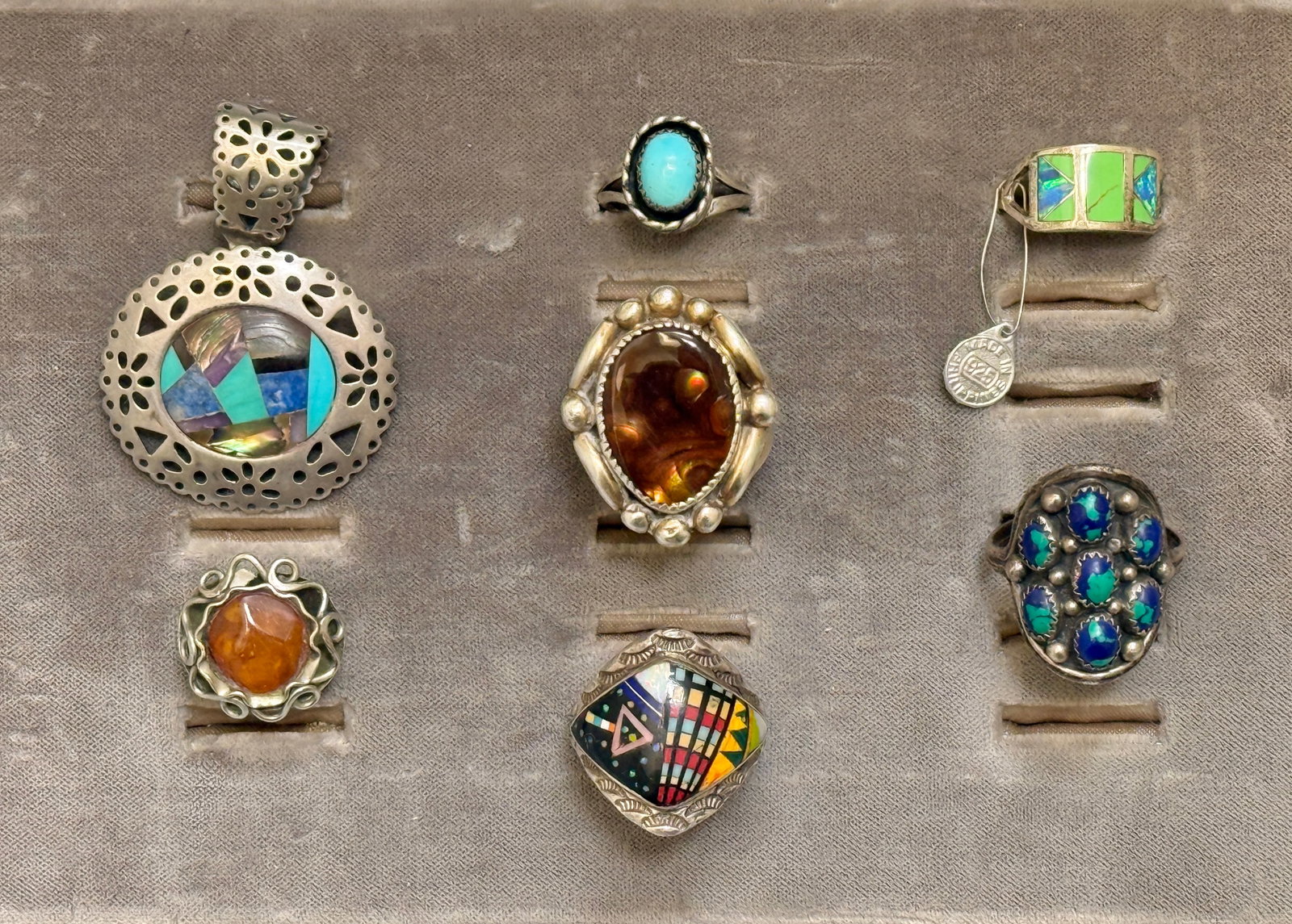 Vintage Southwest Sterling Silver Old Pawn Navajo Rings and Pendant Group (7): Antique vintage seven piece collection of Southwestern jewelry features six rings and one pendant brooch combination piece. The selection showcases traditional Old Pawn and Navajo design including an 