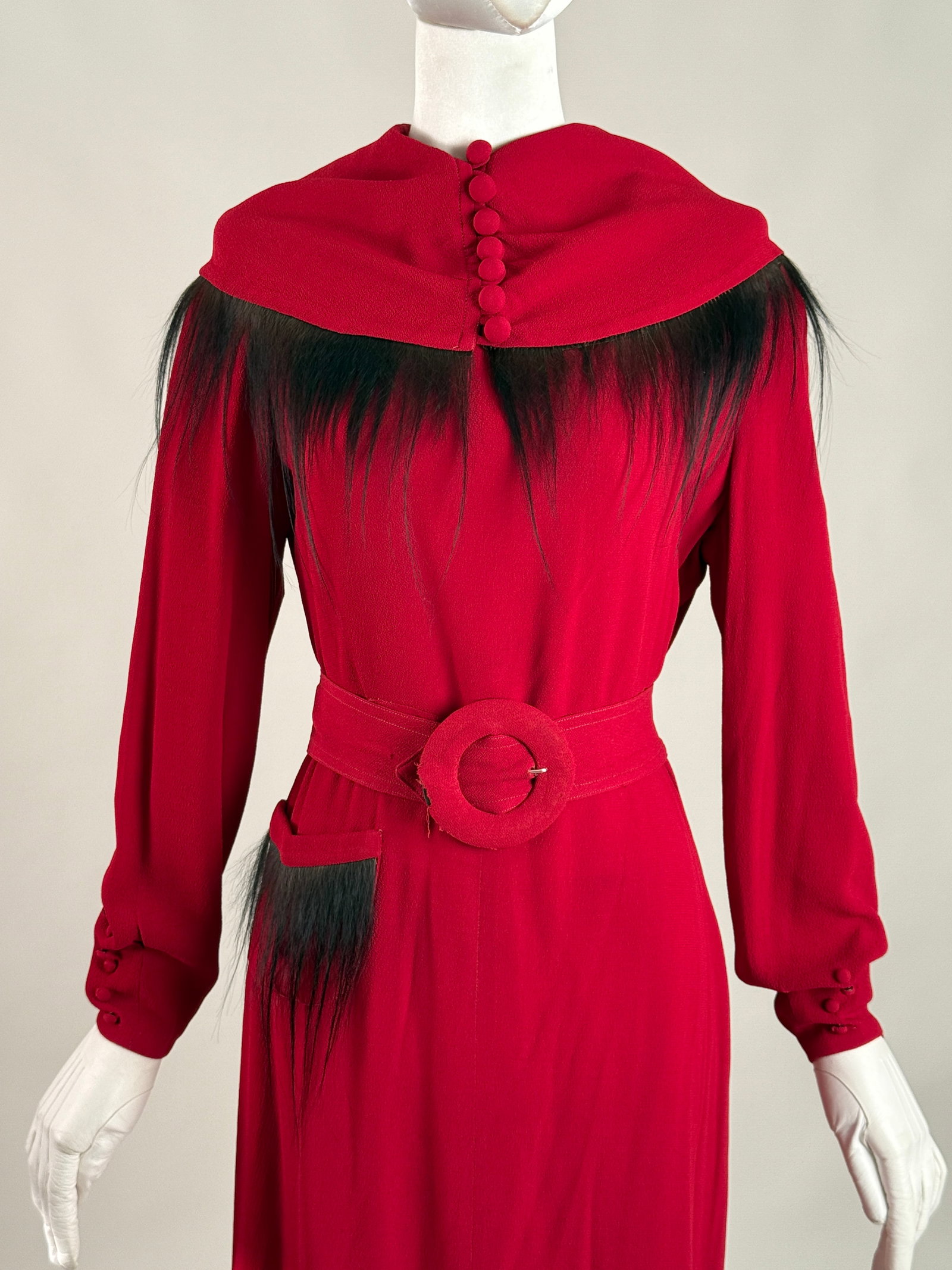Vintage 1930s Red Dress with Long Fur Avant Garde Deco Manner Schiaparelli: Exceptional vintage 1930s avant garde evening dress in a vibrant crimson red crepe. This striking original Art Deco piece is unbranded but reminds us of the surrealist, iconoclastic design ethos of Sc