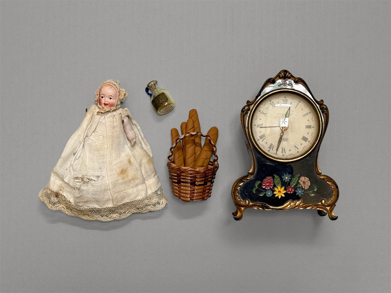 Antique Dollhouse Miniature Lot: German Bisque Doll, Reuge Musical Mantel Clock, & Vintage: A delightful collection of antique dollhouse miniatures. Small antique German bisque head mignonette doll (all bisque lower limbs with painted features and a fragile lace bonnet) Vintage miniature man
