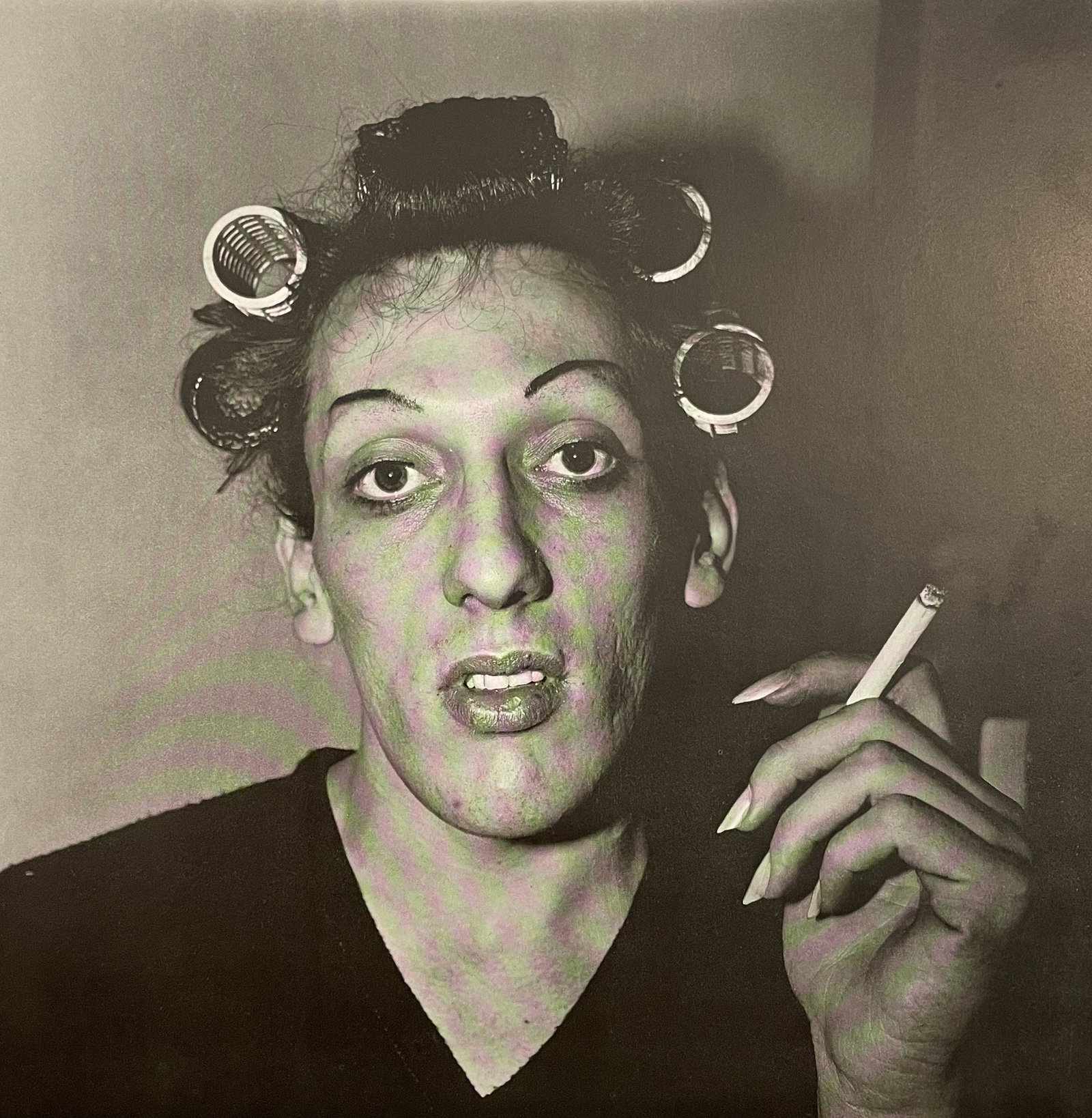 Diane Arbus - A Young Man in Curlers, 1966: DIANE ARBUS (1923-1971) A Young Man in Curlers at home on West 20th Street, NYC, 1966 Print in Colors, Printed in the 1970s 8 1/2" x 8 3/4" Diane Arbus was an American photographer best known for her 