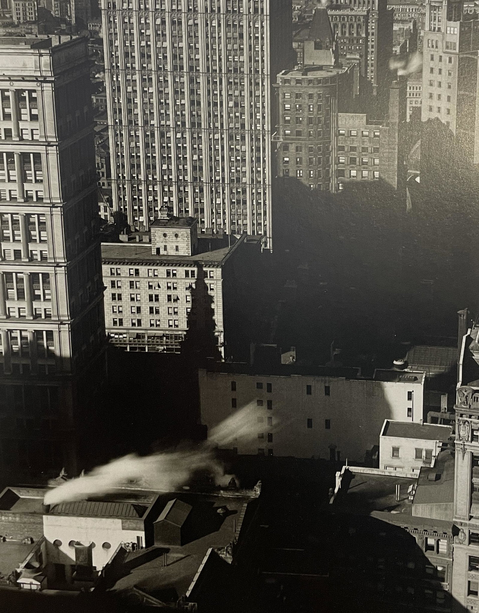 Charles Sheeler - New York, Building in Shadow and Smoke, 1920: CHARLES SHEELER (1883-1965) New York, Building in Shadow and Smoke, 1920 Print in Colors, Printed in the 2000s 6 1/2" x 8 1/4" Charles Sheeler was an American artist known for his involvement in the P