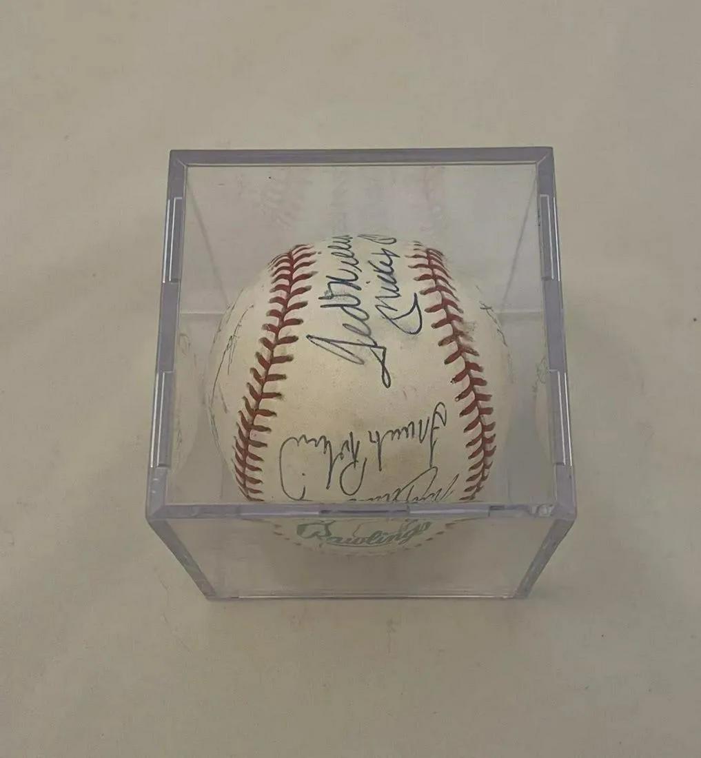 Mickey Mantle, Ted Williams, and More - Hand Signed Baseball: Baseball signed by many players including Mickey Mantle, Ted Williams, and more. Regular sized baseball in a case