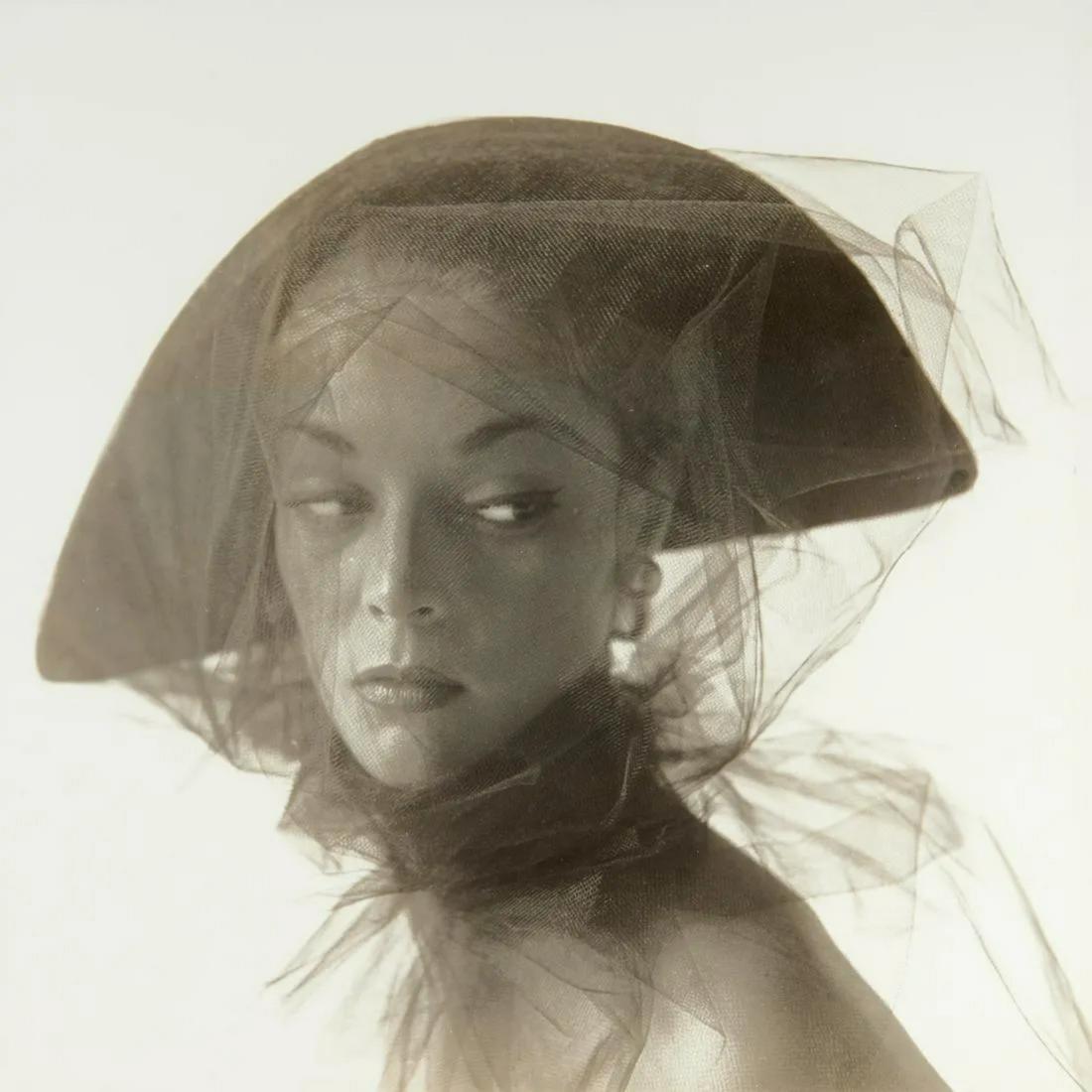 Irving Penn - Girl in Veiled Hat, 1949: IRVING PENN (1917-2009) Girl in Veiled Hat, 1949 Print in Colors 8" x 9" Irving Penn was an American photographer known for both his commercial and fine art work. Using both large format and 35mm came