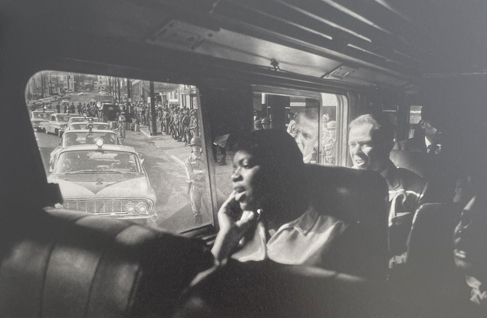 Bruce Davidson - The Freedom Riders, 1961: BRUCE DAVIDSON (B. 1933) The Freedom Riders, 1961 Print in Colors 9 1/2" x 6 1/4" Bruce Davidson is an American photographer known for capturing images of communities and individuals living on the fri