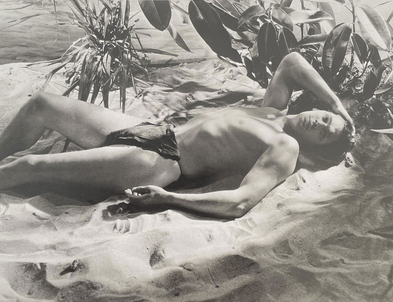 Cecil Beaton - Johnny Weissmuller, Hollywood, 1932: CECIL BEATON (1904-1980) Johnny Weissmuller, Hollywood, 1932 Print in Colors 10 1/4" x 8" Cecil Beaton was a British photographer and designer best known for his elegant photographs of high society. W