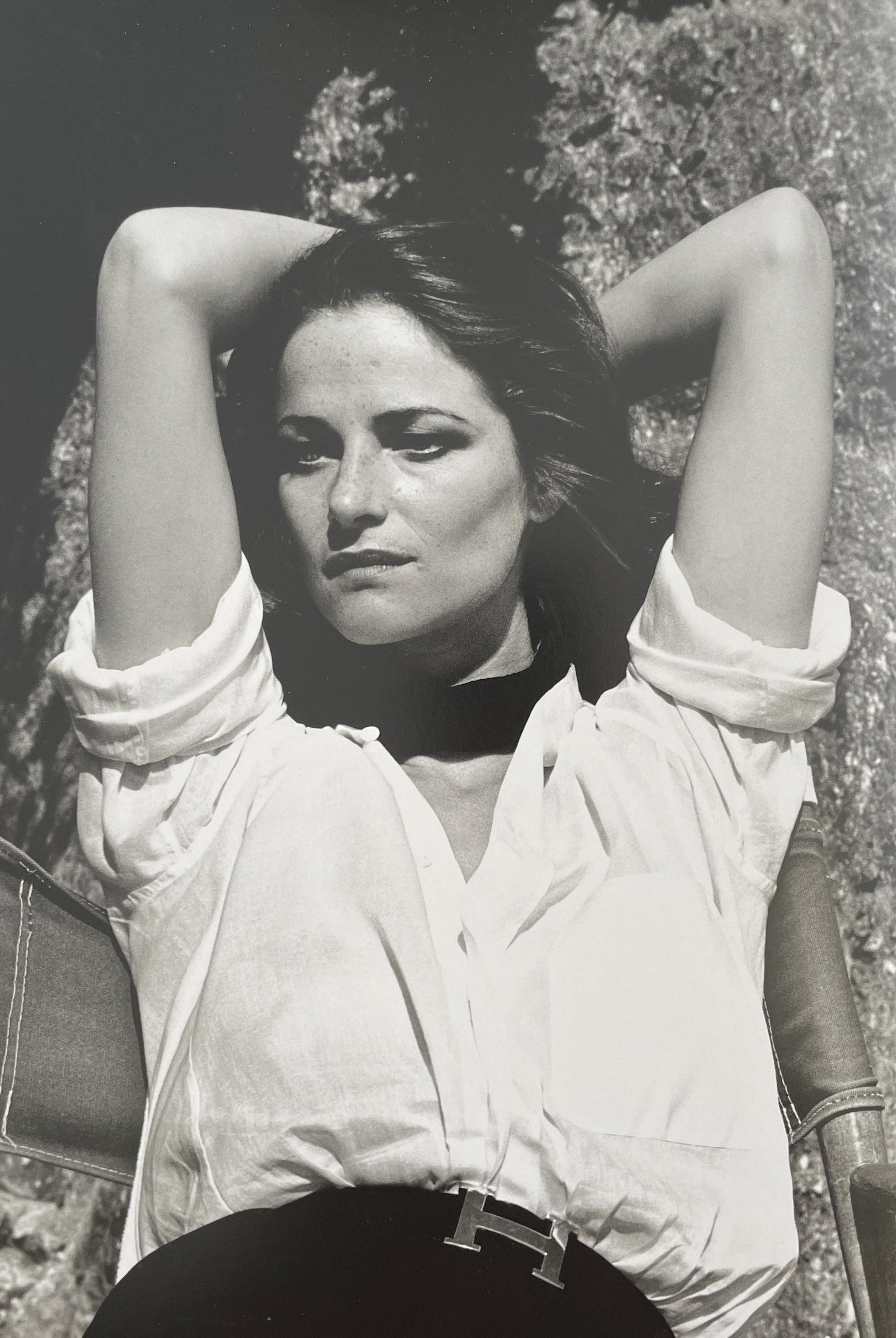 Helmut Newton - Charlotte Rampling, 1976: HELMUT NEWTON (1920-2004) Charlotte Rampling, Saint Tropez, 1976 Print in Colors 9 1/4" x 13 3/4" Helmut Newton was a German high-fashion photographer whose subversive approach to subject matter broug