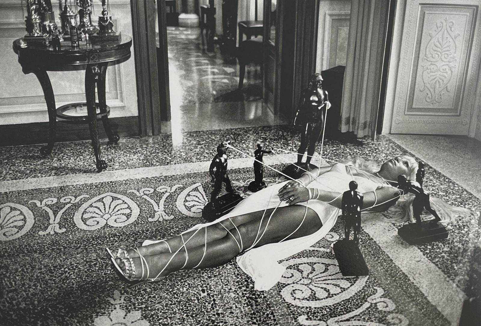 Helmut Newton - Donatella Versace, 1994: HELMUT NEWTON (1920-2004) Donatella Versace, Lake Como, Italy, 1994 Print in Colors 6 1/2" x 9 3/4" Helmut Newton was a German high-fashion photographer whose subversive approach to subject matter bro