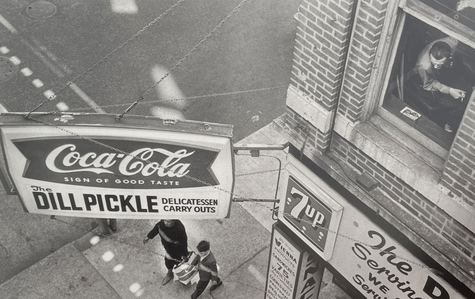 Bruce Davidson - The Chicago Loop, 1963: BRUCE DAVIDSON (B. 1933) The Chicago Loop, 1963 Print in Colors 9 1/2" x 6 1/4" Bruce Davidson is an American photographer known for capturing images of communities and individuals living on the fring