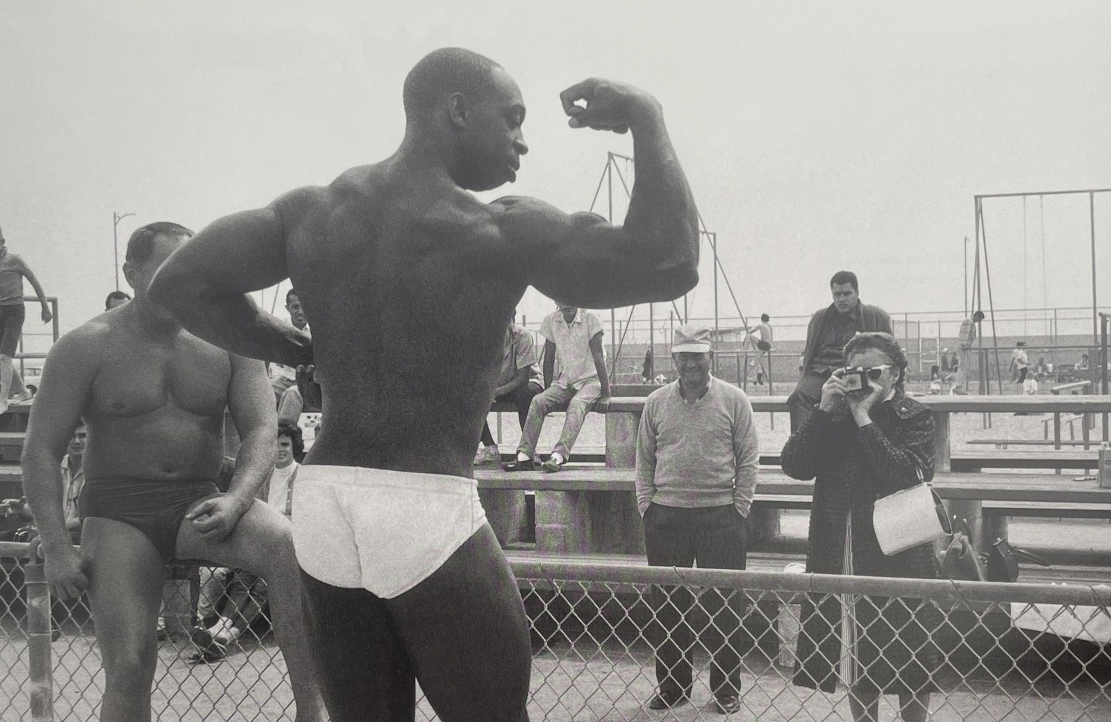 Bruce Davidson - Los Angeles, 1964: BRUCE DAVIDSON (B. 1933) Los Angeles, 1964 Print in Colors 9 1/2" x 6 1/4" Bruce Davidson is an American photographer known for capturing images of communities and individuals living on the fringes of