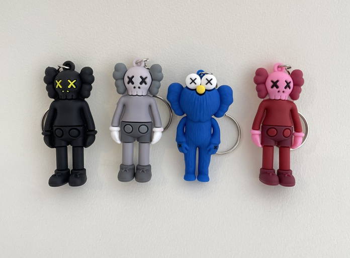 Kaws Grouping Of 4, Keychains