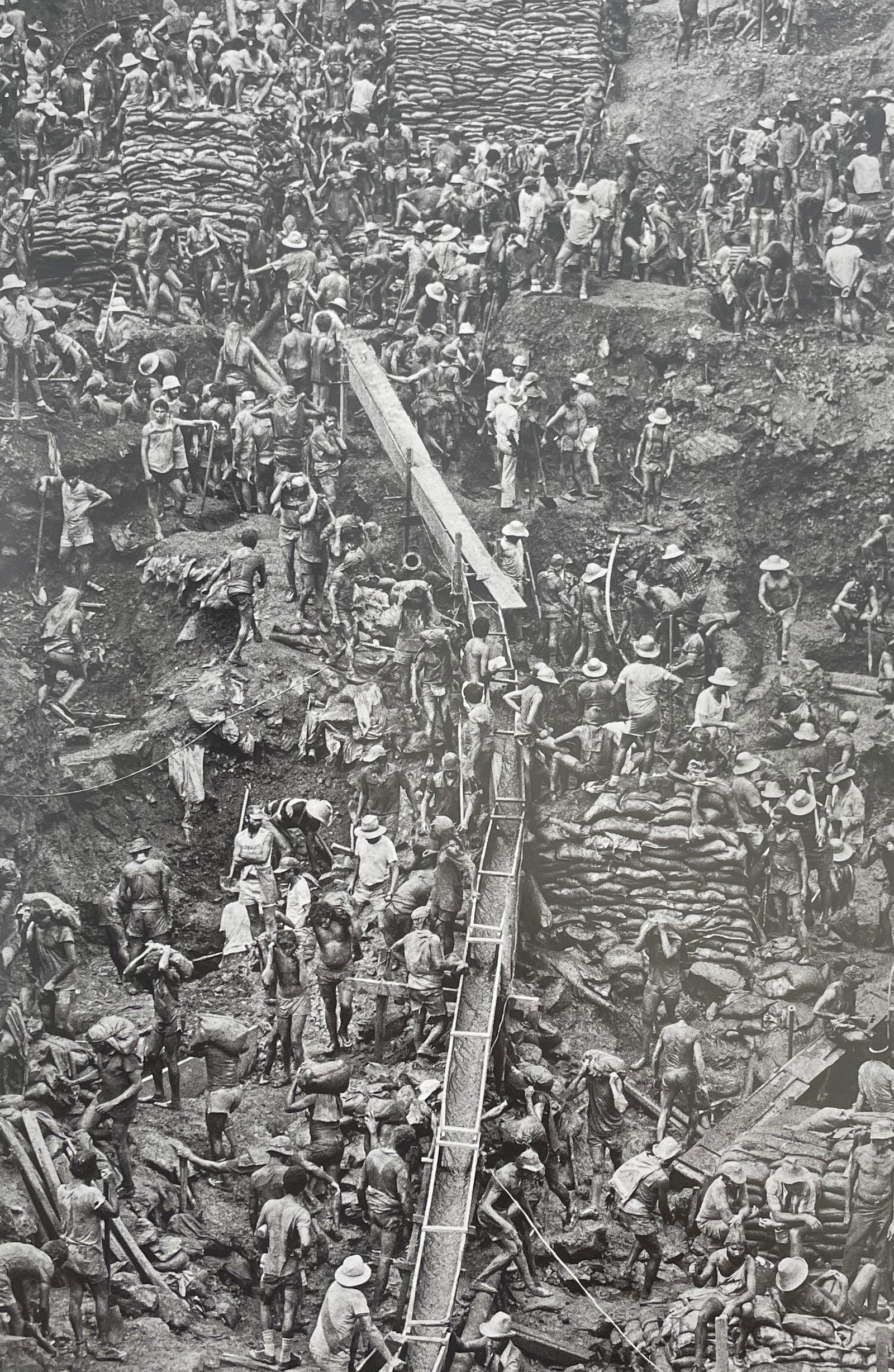 Sebastiao Salgado - Goldmine Serra Pelada, Brazil, 1986: SEBASTIAO SALGADO (B. 1944) Title - Goldmine Serra Pelada, Brazil, 1986 Type of Print - Print in Colors Estimated Image Size - 7 3/4" x 11 1/2" SebastiÃ£o Salgado is a Brazilian photojournalist whos