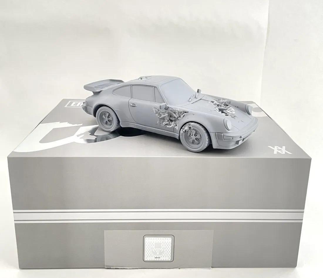 After Daniel Arsham - Eroded 911 Turbo, Porsche Figure (Edition of 500): AFTER DANIEL ARSHAM (B. 1980) Eroded 911 Turbo, Porsche Figure (Grey) Made out of an edition of 500, this particular one is 349/500 3 1/2" x 5 1/4" x 11 3/4"
