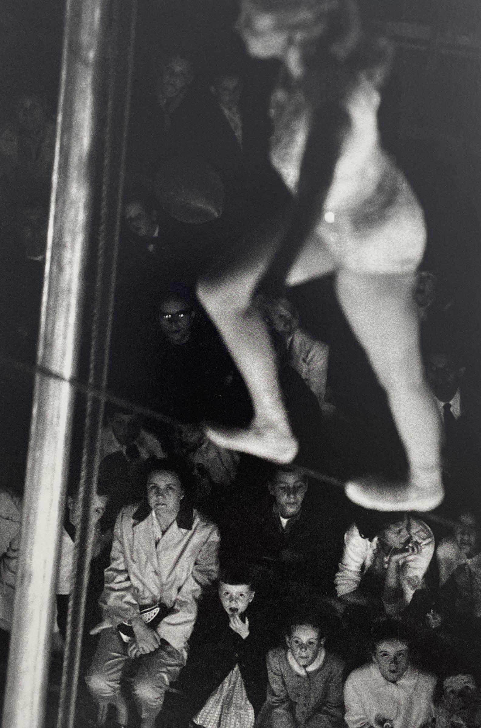 Bruce Davidson - The Dwarf and The Clyde Beatty Cirucs, 1958: BRUCE DAVIDSON (B.1933) Title - The Dwarf and The Clyde Beatty Circus, 1958 Type of Print - Print in Colors Approximate Image Size - 9" x 6" Bruce Davidson is an American photographer known for captur