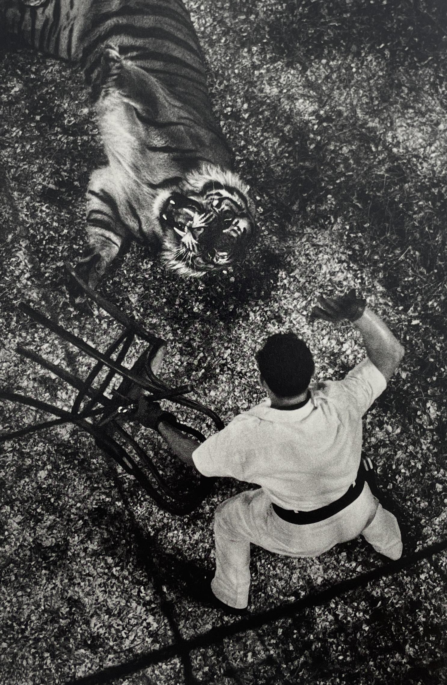 Bruce Davidson - The Dwarf and The Clyde Beatty Circus, 1958: BRUCE DAVIDSON (B.1933) Title - The Dwarf and The Clyde Beatty Circus, 1958 Type of Print - Print in Colors Approximate Image Size - 9" x 6" Bruce Davidson is an American photographer known for captur