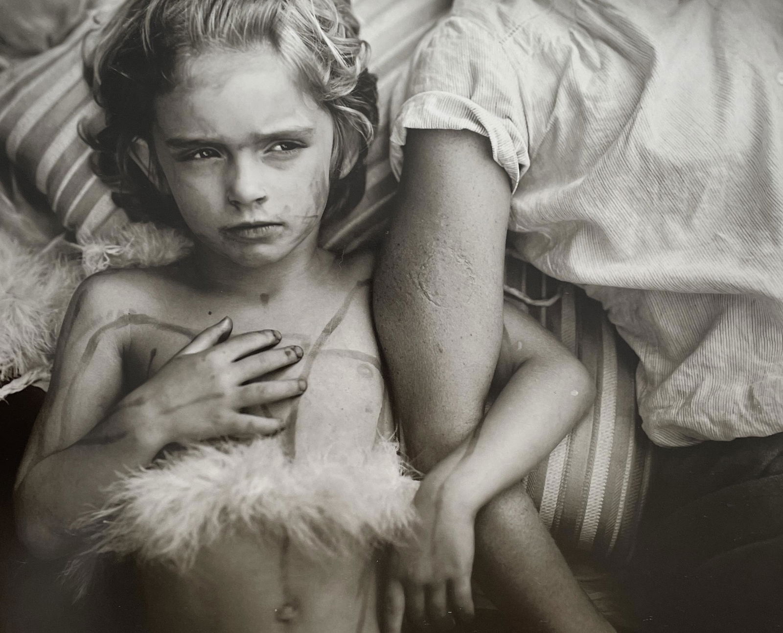 Sally Mann - Jessie Bites, 1985: SALLY MANN (B.1959) Title - Jessie Bites, 1985 Type of Print - Print in Colors Approximate Image Size - 9 1/2" x 8" Sally Mann is an American photographer known for her black-and-white portraits of he