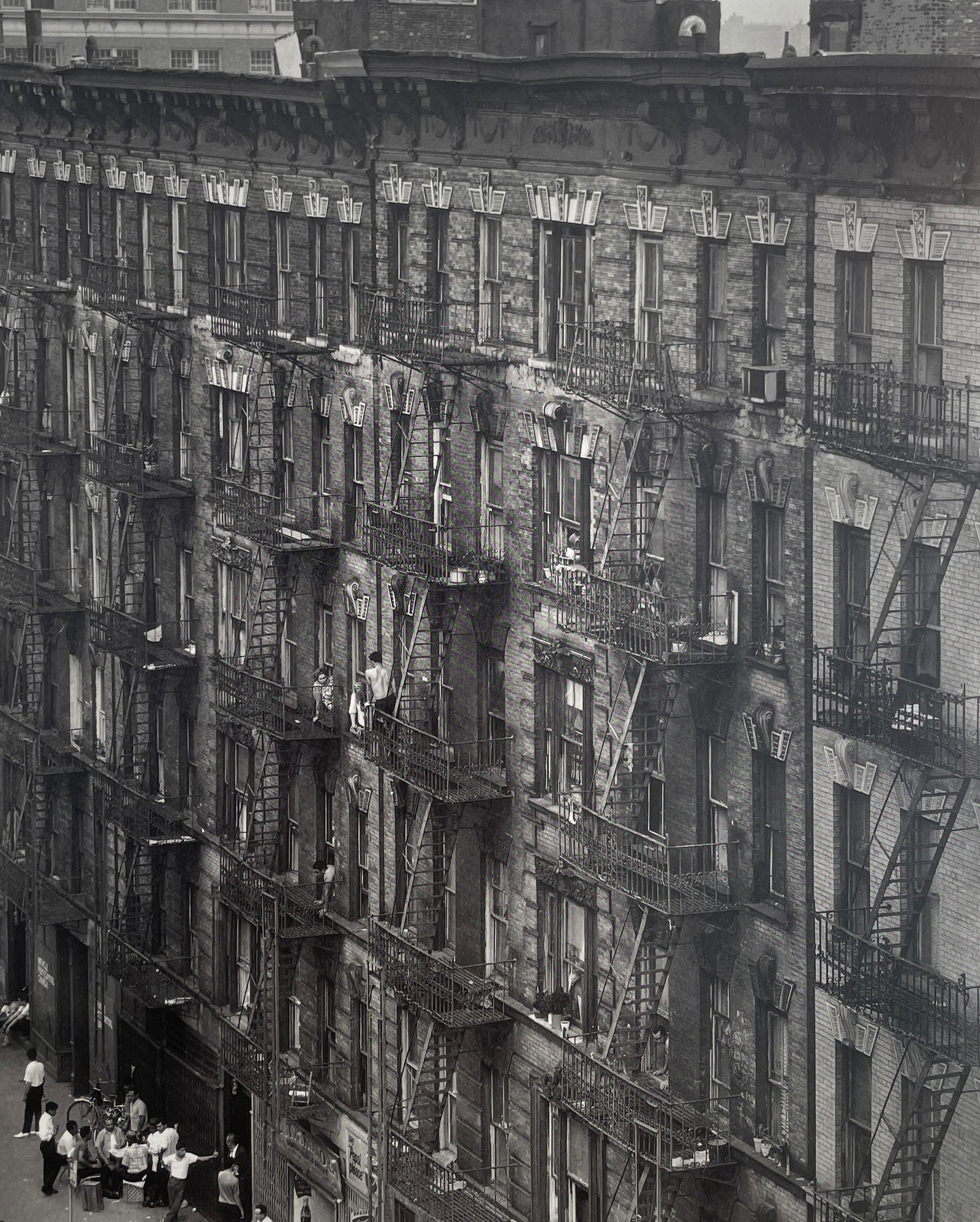 Bruce Davidson - East 100th St, 1966: BRUCE DAVIDSON (B.1933) Title - East 100th Street, 1966 Type of Print - Print in Colors Approximate Image Size - 9" x 7" Bruce Davidson is an American photographer known for capturing images of commun