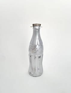 Andy Warhol "You're In" Signed Coke Bottle: ANDY WARHOL (1928-1987) You're In Silver Spray Painted Coke Bottle, Signed on the Stopper "A.W" 8" Tall