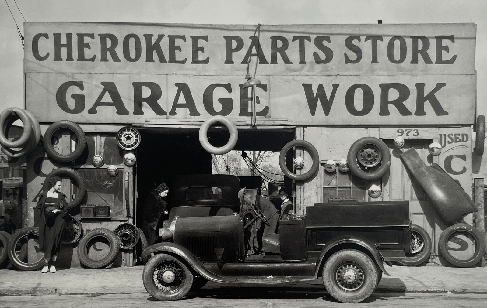 Walker Evans - Garage in Southern City Outskirts, 1936: WALKER EVANS (1903-1975) Title - Garage in Southern City Outskirts, 1936 Type of Print - Print in Colors Approximate Image Size - 4 1/2" x 7" Walker Evans was a renowned American photographer known fo