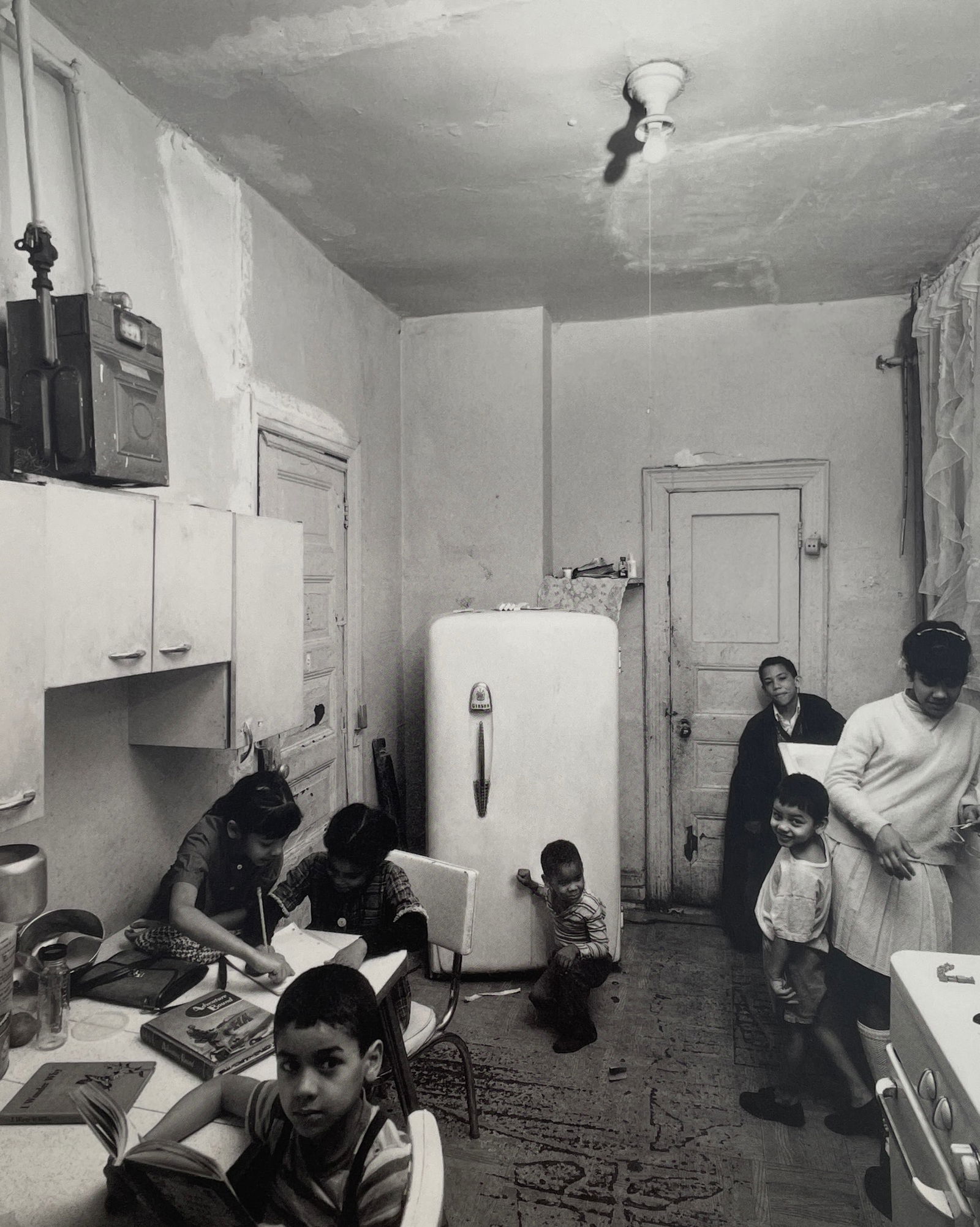 Bruce Davidson - East 100th St, 1966: BRUCE DAVIDSON (B.1933) Title - East 100th Street, 1966 Type of Print - Print in Colors Approximate Image Size - 9" x 7" Bruce Davidson is an American photographer known for capturing images of commun