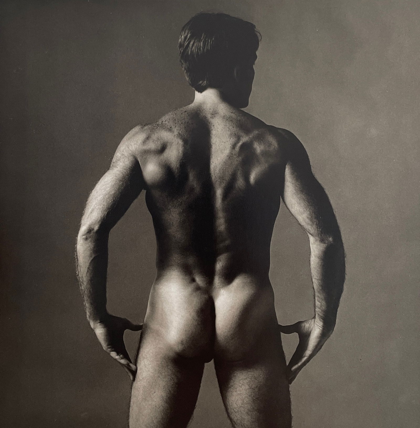 Ken Haak - Male Nude, 1986: KEN HAAK (1923-1991) Title - Male Nude, 1986 Type of Print - Print in Colors Approximate Image Size - 7 3/4" x 7 3/4" Ken Haak became a self-taught explorer in fashion photography who played light and