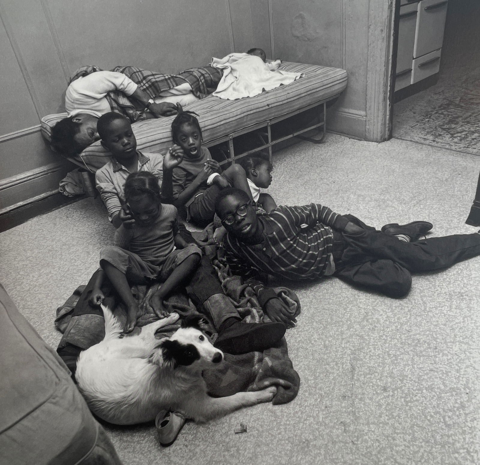 Bruce Davidson - East 100th St, 1966: BRUCE DAVIDSON (B.1933) Title - East 100th Street, 1966 Type of Print - Print in Colors Approximate Image Size - 9" x 9" Bruce Davidson is an American photographer known for capturing images of commun