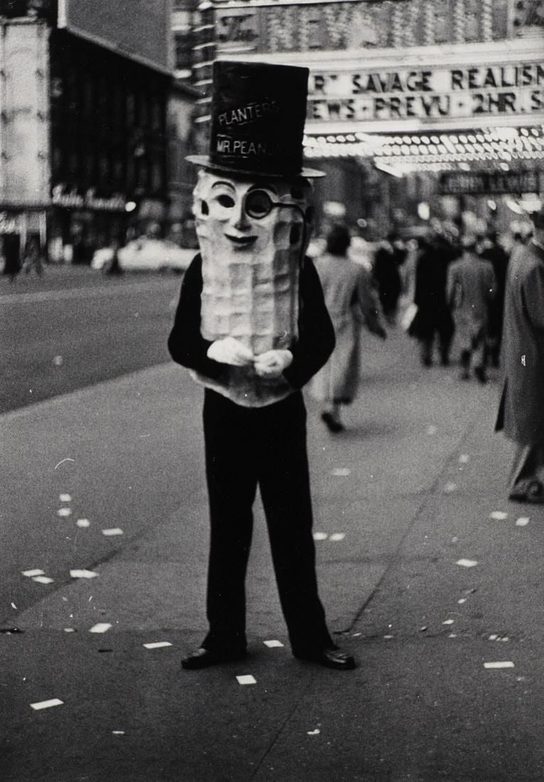 Diane Arbus - Mr. Peanut in Times Square, 1956: DIANE ARBUS (1923-1971) Mr. Peanut in Times Square, NYC, 1956 Print in Colors 5 1/4" x 7"