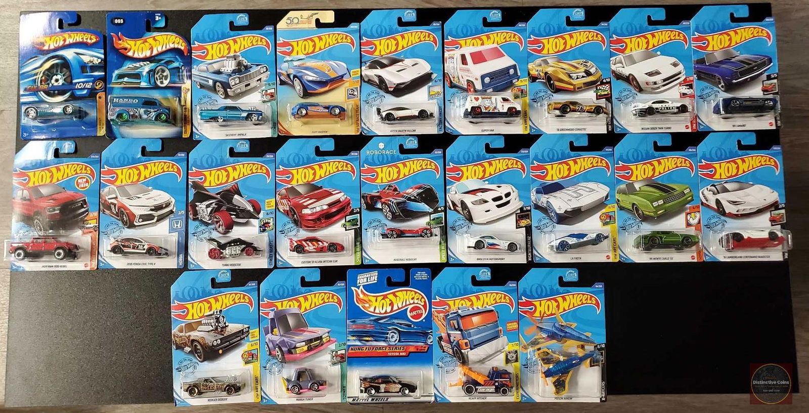 Hot Wheels series lot of 47 carded cars: Hot Wheels series lot. 47 series cars from various sets and years.