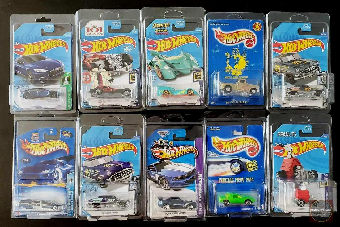 Hot Wheels lot of 10 carded cars in card holders: Hot Wheels lot of 10 cars. Mix of both singles, and set series variations. All cars in card protectors.