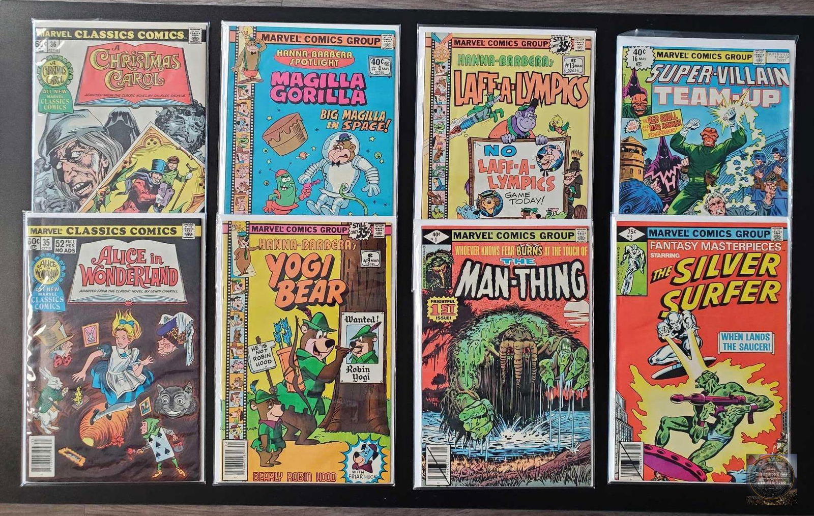 Mixed lot of 8 Marvel comics Hanna Barbera, Classic Comics, Silver Surfer, and Man Thing #1 (1 of 5)
