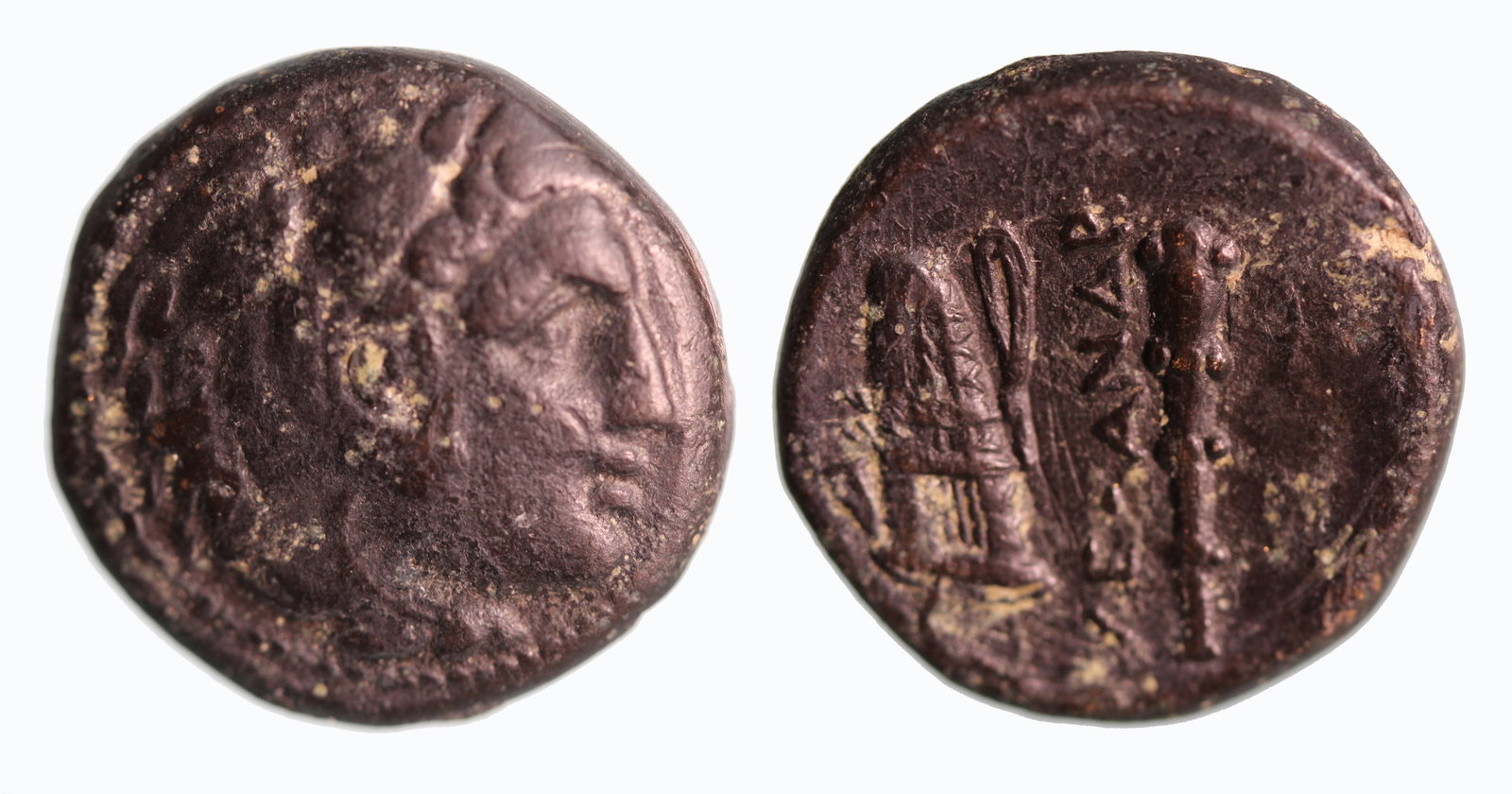 Alexander the Great 336-323 BC: Bronze, 16 mm, 6.79 gm.Obverse: Head of Herakles facing left in Nemean lionskinReverse: ALEXANDROUQuiver and club.Ca. 336-323 BC.Alexander III, the son of Philip II, was born at Pella on 20 July, 356 