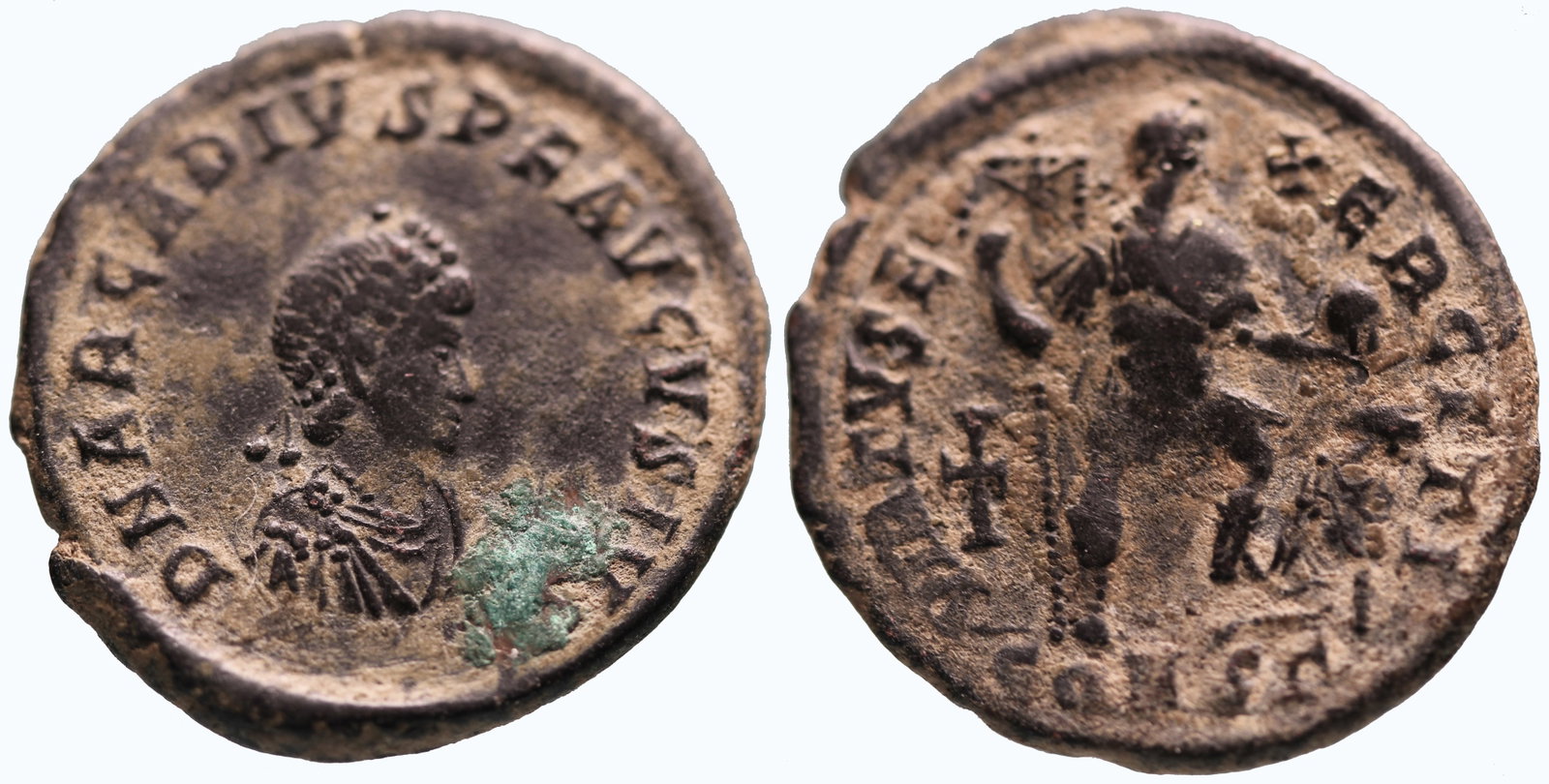 Arcadius 383-408 AD: Bronze, 23 mm, 5.07 gm.Obv: DN ARCADIVS PF AVGVSTVSDiademed, draped, and cuirassed bust right. Rev: Arcadius standing right, foot on captive, holding globe and standard.383-408 AD.
